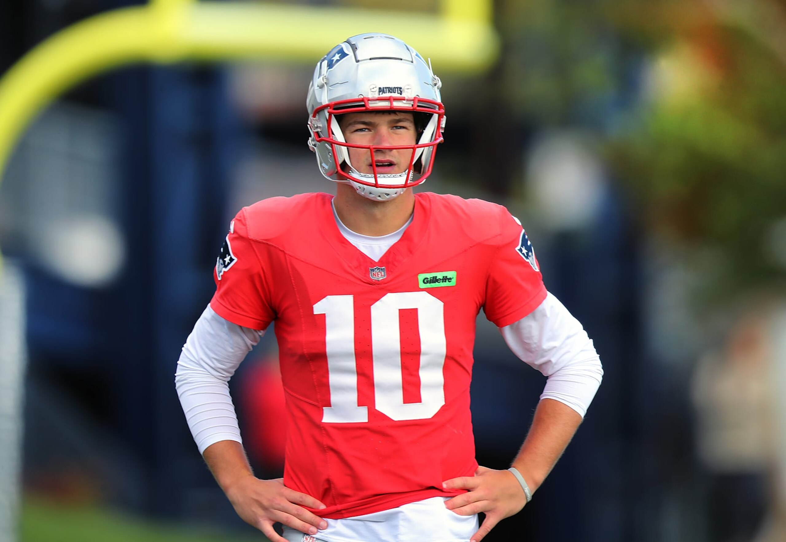 Foxborough, MA - October 16: New England Patriots QB Drake Maye stands with his hands on his hips during practice. (Photo by John Tlumacki/The Boston Globe via Getty Images)