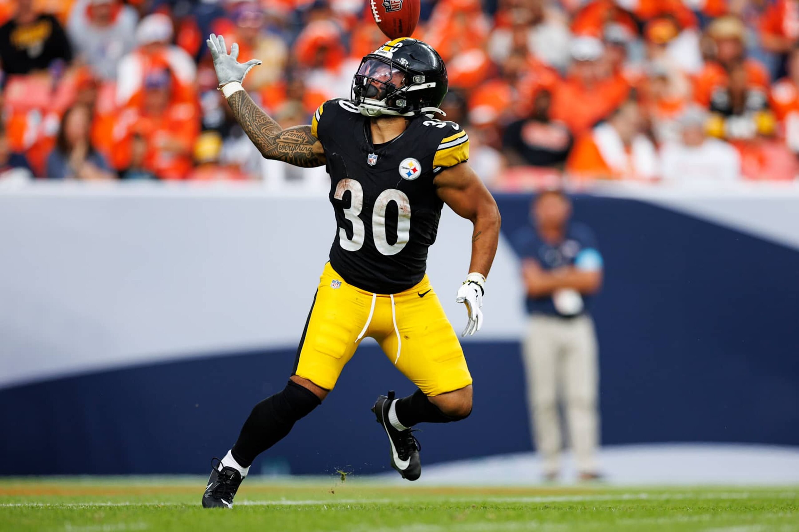 DENVER, CO - SEPTEMBER 15: Running back Jaylen Warren #30 of the Pittsburgh Steelers receives the punt during the fourth quarter of an NFL football game against the Denver Broncos, at Empower Field at Mile High on September 15, 2024 in Denver, Colorado. (Photo by Brooke Sutton/Getty Images)