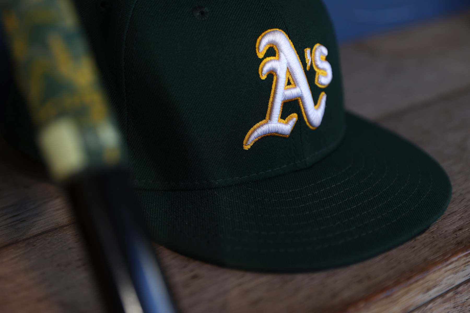 SEATTLE, WASHINGTON - SEPTEMBER 27: A general view of an Oakland Athletics logo and hat before the game against the Seattle Mariners at T-Mobile Park on September 27, 2024 in Seattle, Washington. (Photo by Steph Chambers/Getty Images)