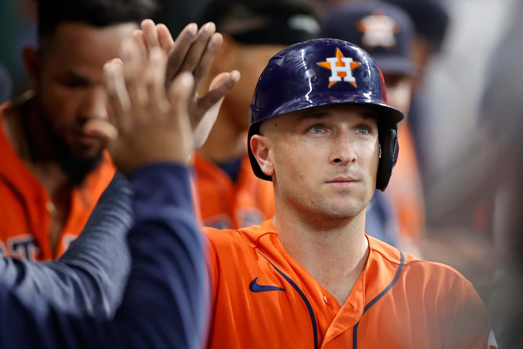 HOUSTON, TEXAS - APRIL 30: Alex Bregman #2 of the Houston Astros high fives teammates after scoring on a single hit by Kyle Tucker #30 of the Houston Astros during the fifth inning against the Philadelphia Phillies at Minute Maid Park on April 30, 2023 in Houston, Texas. (Photo by Carmen Mandato/Getty Images)