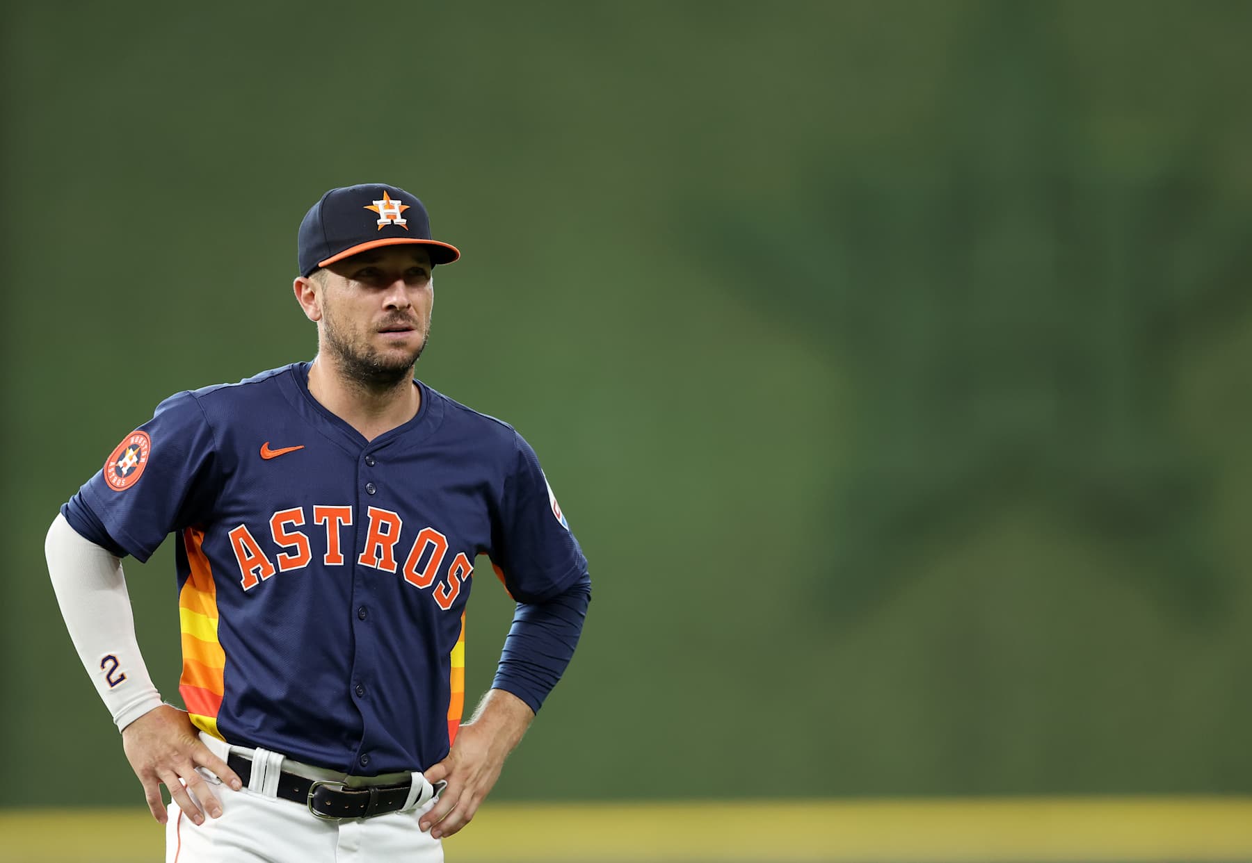 HOUSTON, TEXAS - JULY 28: Alex Bregman #2 of the Houston Astros warms up before the game against the Los Angeles Dodgers at Minute Maid Park on July 28, 2024 in Houston, Texas. (Photo by Tim Warner/Getty Images)
