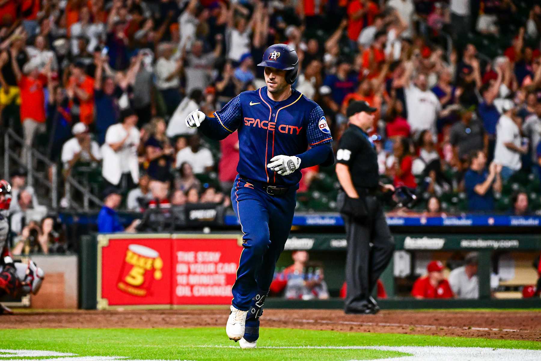 HOUSTON, TEXAS - JUNE 03: Alex Bregman #2 of the Houston Astros celebrates after hitting a solo home run in the eighth inning against the St. Louis Cardinals at Minute Maid Park on June 03, 2024 in Houston, Texas. (Photo by Logan Riely/Getty Images)