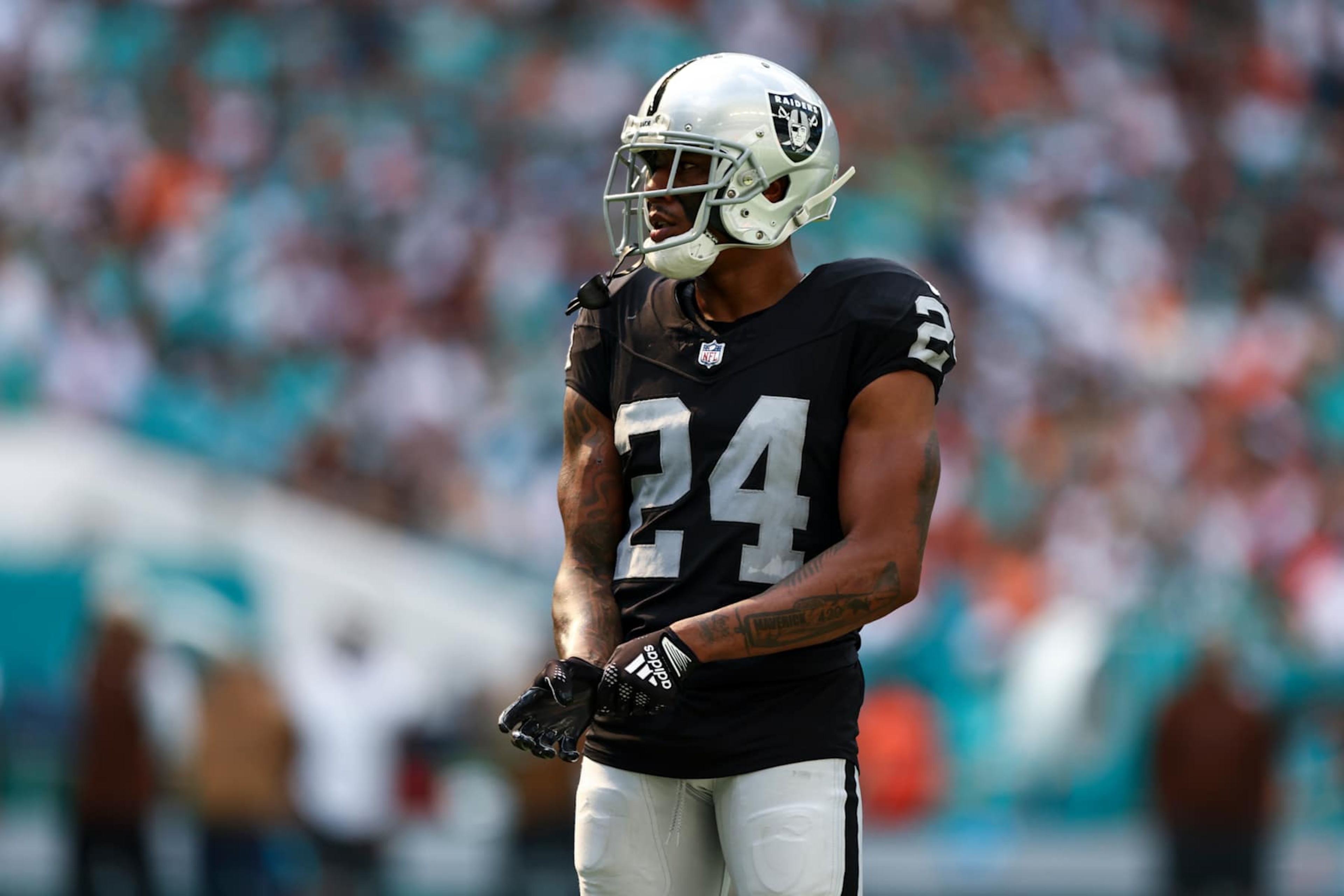 MIAMI GARDENS, FL - NOVEMBER 19: Marcus Peters #24 of the Las Vegas Raiders looks on during an NFL football game against the Miami Dolphins at Hard Rock Stadium on November 19, 2023 in Miami Gardens, Florida. (Photo by Kevin Sabitus/Getty Images) MIAMI GARDENS, FL - NOVEMBER 19: Marcus Peters #24 of the Las Vegas Raiders looks on during an NFL football game against the Miami Dolphins at Hard Rock Stadium on November 19, 2023 in Miami Gardens, Florida. (Photo by Kevin Sabitus/Getty Images)