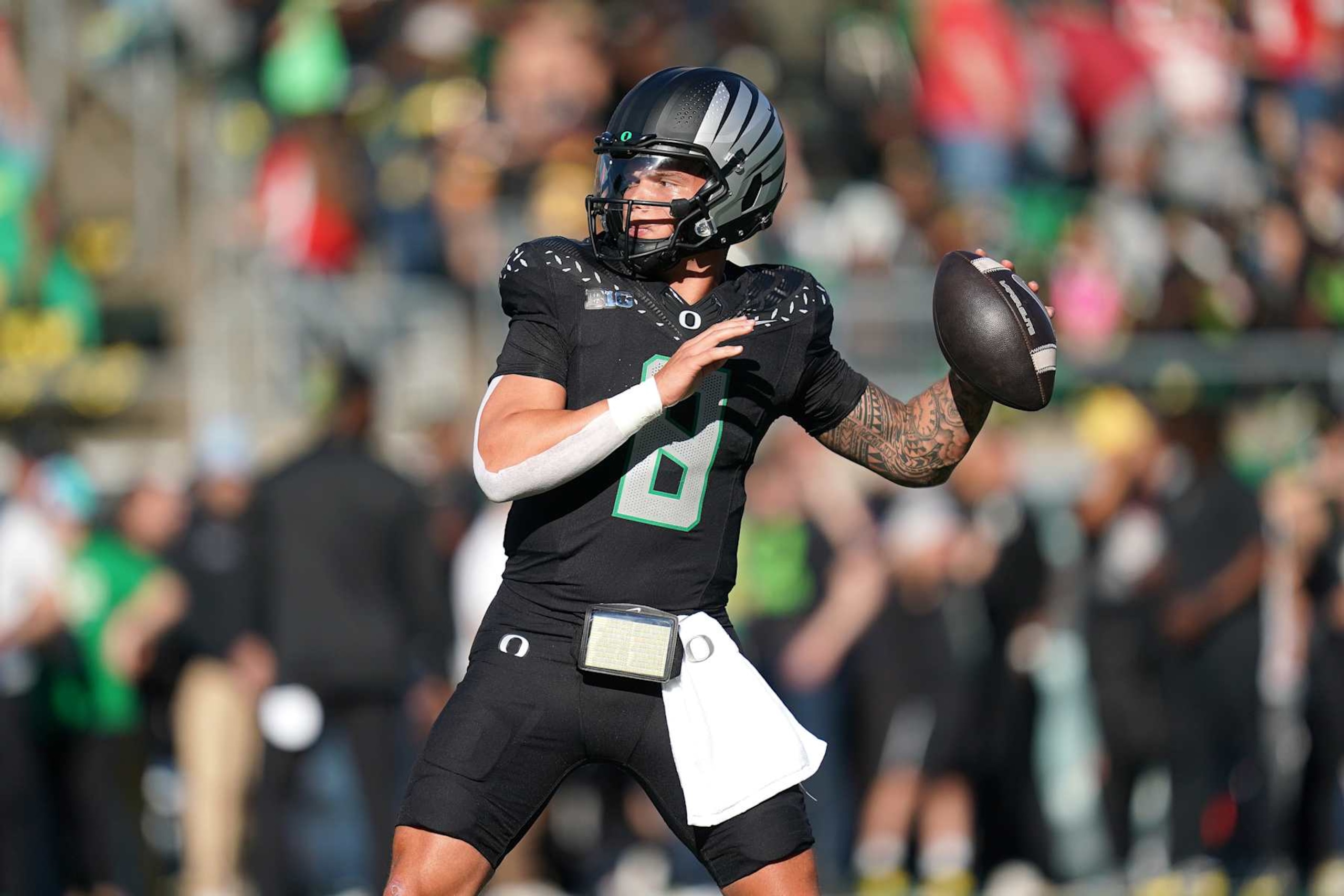 EUGENE, OREGON - OCTOBER 12: Dillon Gabriel #8 of the Oregon Ducks warms-up prior to a game against the Ohio State Buckeyes at Autzen Stadium on October 12, 2024 in Eugene, Oregon. (Photo by Ali Gradischer/Getty Images)