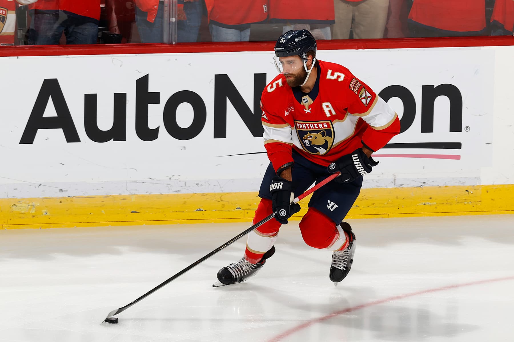 SUNRISE, FL - OCTOBER 17: Aaron Ekblad #5 of the Florida Panthers skates with the puck prior to the game against the Vancouver Canucks at the Amerant Bank Arena on October 17, 2024 in Sunrise, Florida. (Photo by Joel Auerbach/Getty Images)
