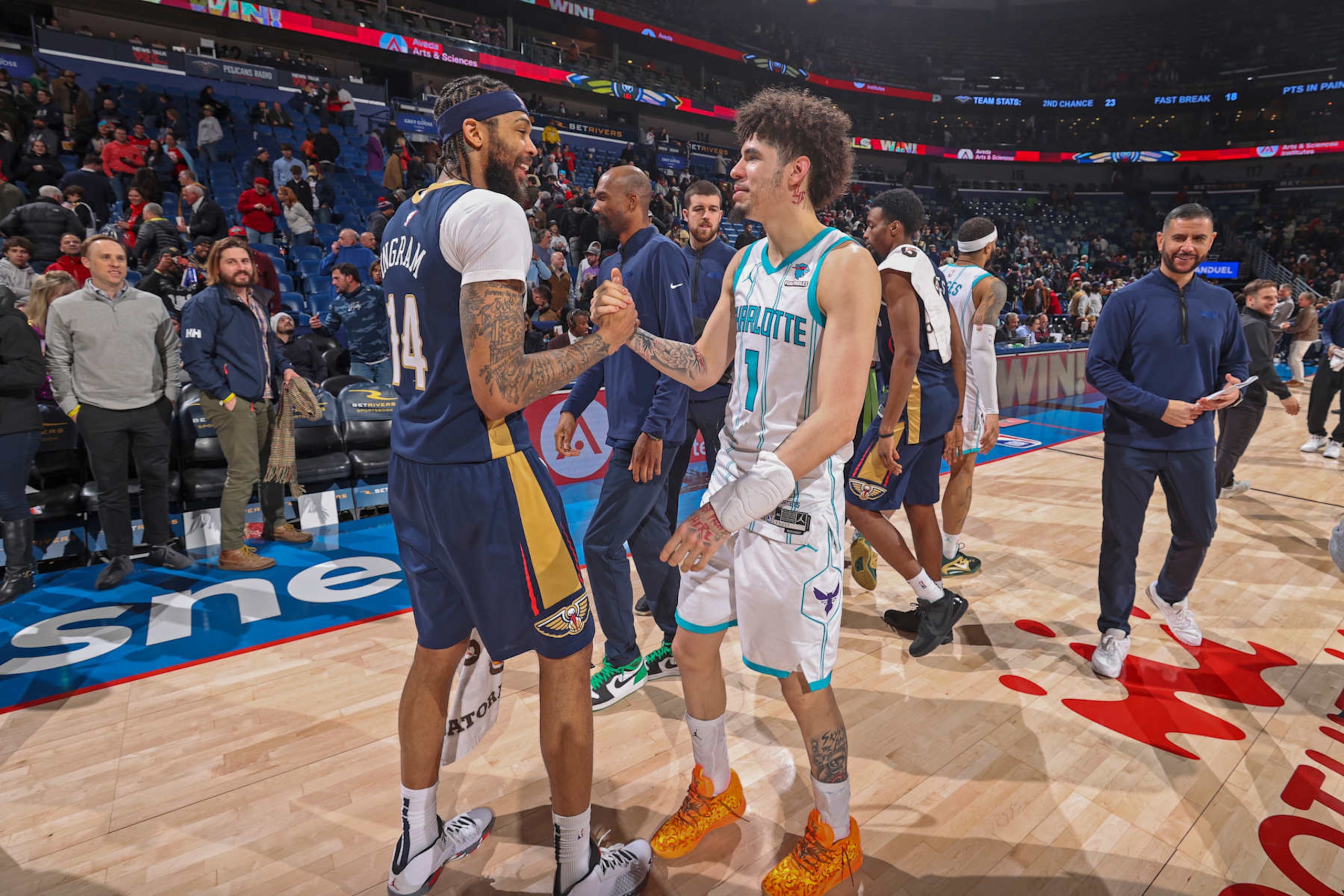 NEW ORLEANS, LA - JANUARY 17: Brandon Ingram #14 of the New Orleans Pelicans and LaMelo Ball #1 of the Charlotte Hornets high five after the game on January 17, 2024 at the Smoothie King Center in New Orleans, Louisiana. NOTE TO USER: User expressly acknowledges and agrees that, by downloading and or using this Photograph, user is consenting to the terms and conditions of the Getty Images License Agreement. Mandatory Copyright Notice: Copyright 2024 NBAE (Photo by Layne Murdoch Jr./NBAE via Getty Images)