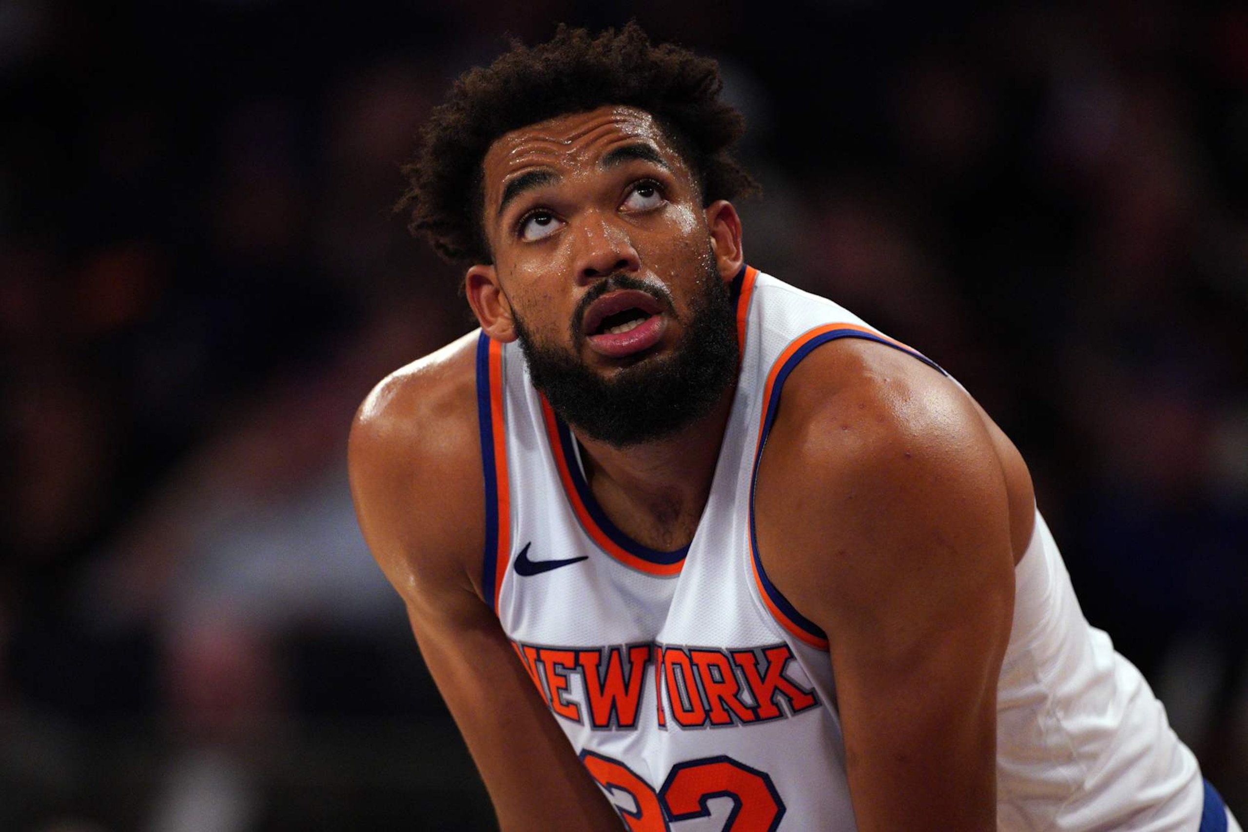 NEW YORK, NEW YORK - OCTOBER 09: Karl-Anthony Towns #32 of the New York Knicks looks on against the Washington Wizards during the second half of a preseason game at Madison Square Garden on October 09, 2024 in New York City. NOTE TO USER: User expressly acknowledges and agrees that, by downloading and or using this Photograph, user is consenting to the terms and conditions of the Getty Images License Agreement. (Photo by Evan Bernstein/Getty Images)