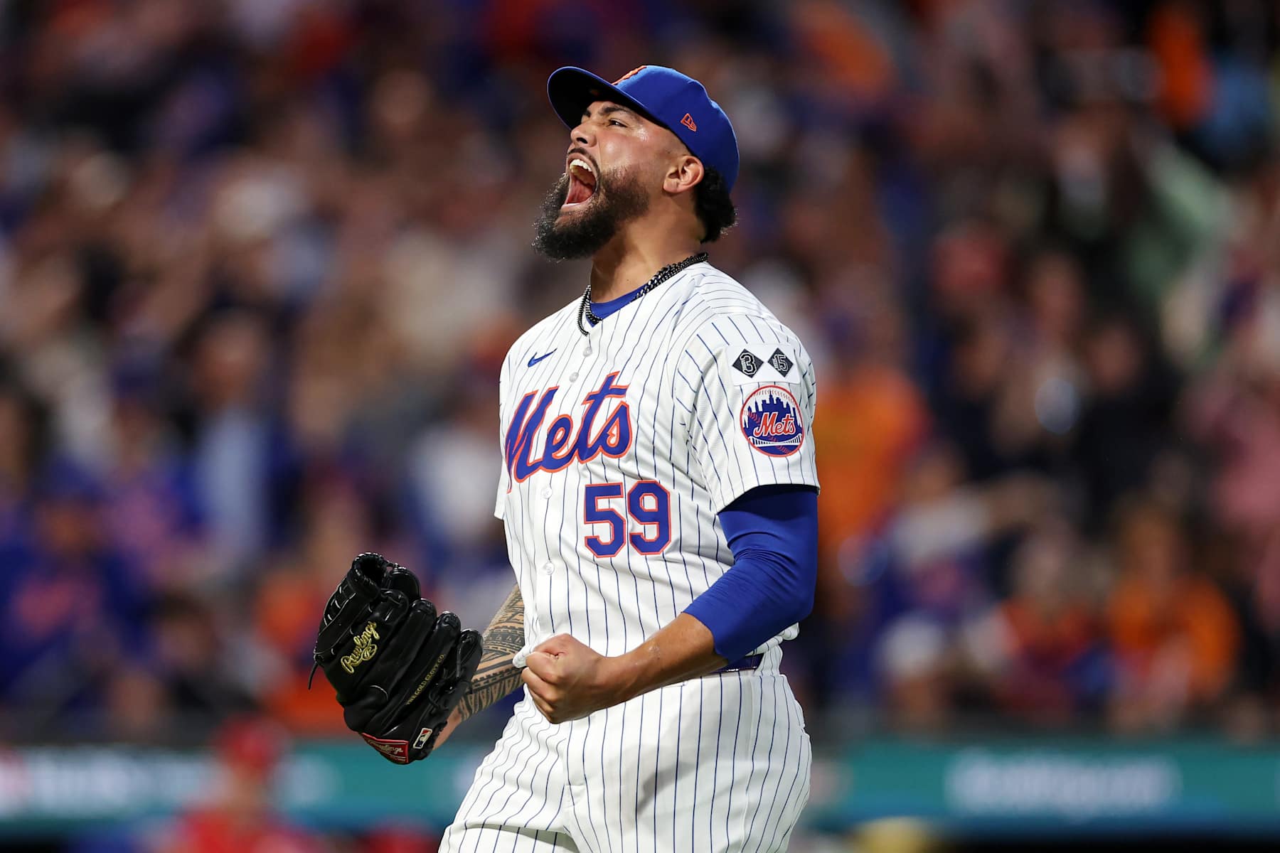 NEW YORK, NEW YORK - OCTOBER 08: Sean Manaea #59 of the New York Mets reacts after a double play to end the sixth inning against the Philadelphia Phillies during Game Three of the Division Series at Citi Field on October 08, 2024 in New York City. (Photo by Elsa/Getty Images)
