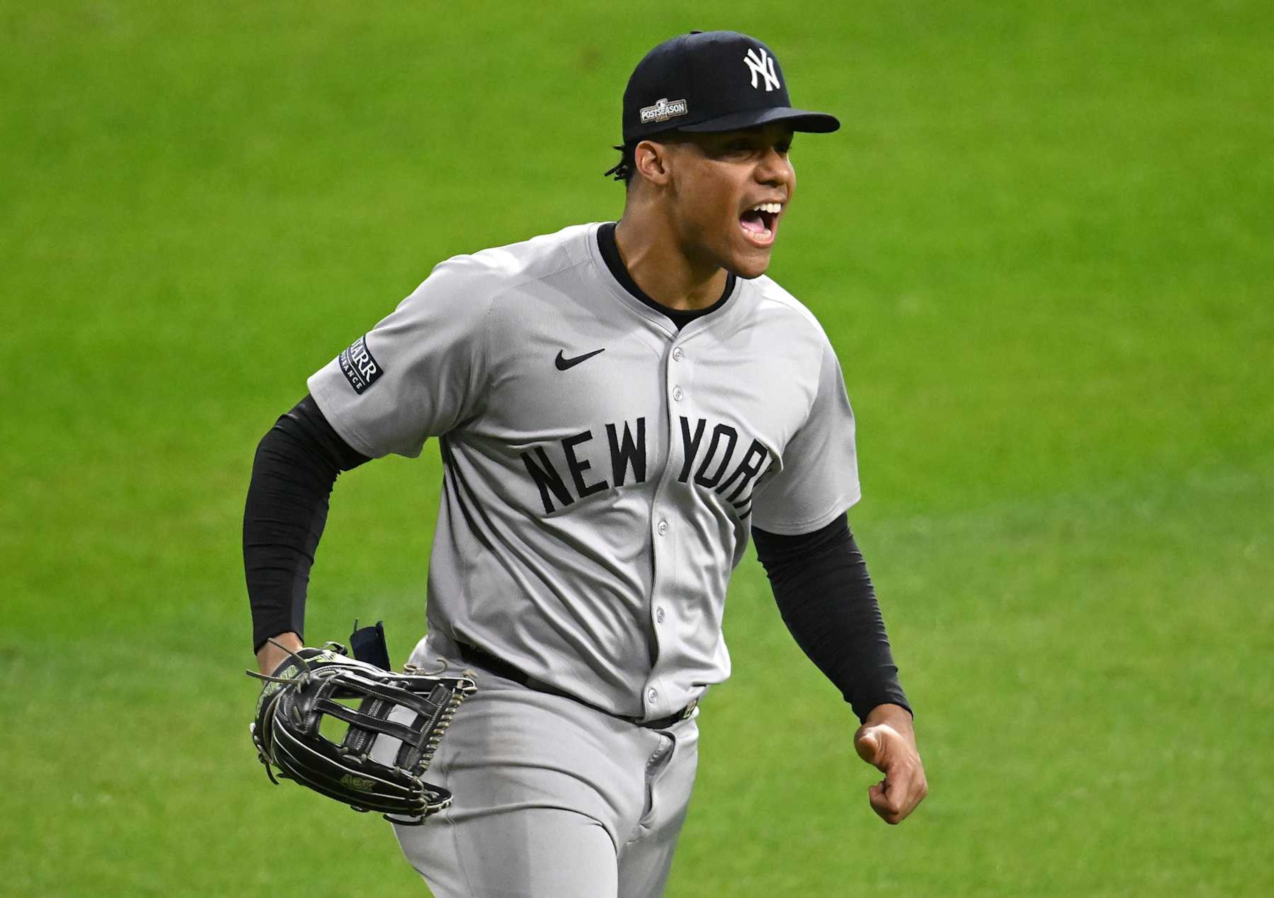 CLEVELAND, OHIO - OCTOBER 17: Juan Soto #22 of the New York Yankees celebrate an out during the ninth inning against the Cleveland Guardians during Game Three of the American League Championship Series at Progressive Field on October 17, 2024 in Cleveland, Ohio. (Photo by Nick Cammett/Getty Images)