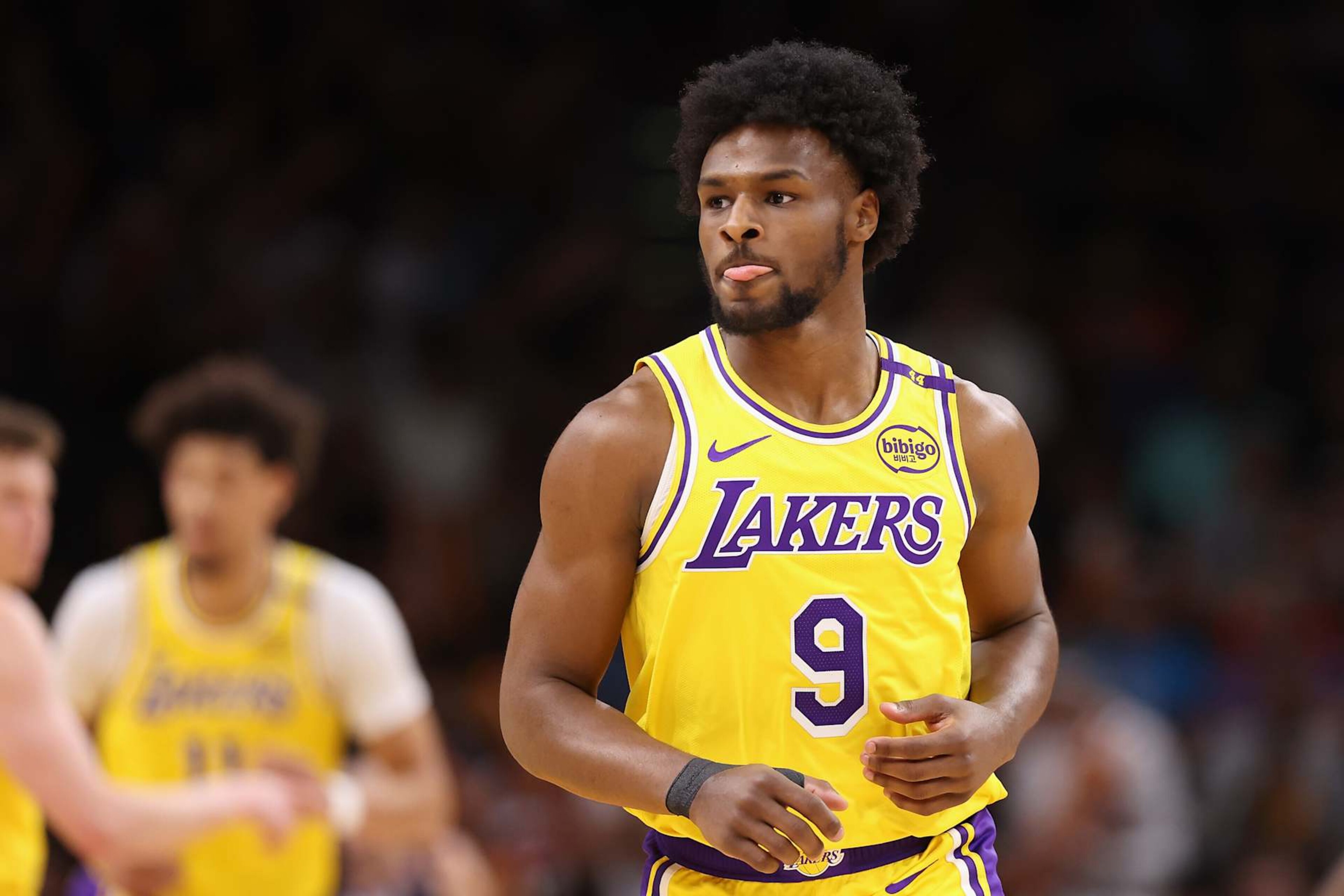 PHOENIX, ARIZONA - OCTOBER 17: Bronny James #9 of the Los Angeles Lakers reacts during the second half of the preseason NBA game against the Phoenix Suns at Footprint Center on October 17, 2024 in Phoenix, Arizona. NOTE TO USER: User expressly acknowledges and agrees that, by downloading and/or using this photograph, user is consenting to the terms and conditions of the Getty Images License Agreement. (Photo by Christian Petersen/Getty Images) PHOENIX, ARIZONA - OCTOBER 17: Bronny James #9 of the Los Angeles Lakers reacts during the second half of the preseason NBA game against the Phoenix Suns at Footprint Center on October 17, 2024 in Phoenix, Arizona. NOTE TO USER: User expressly acknowledges and agrees that, by downloading and/or using this photograph, user is consenting to the terms and conditions of the Getty Images License Agreement. (Photo by Christian Petersen/Getty Images)
