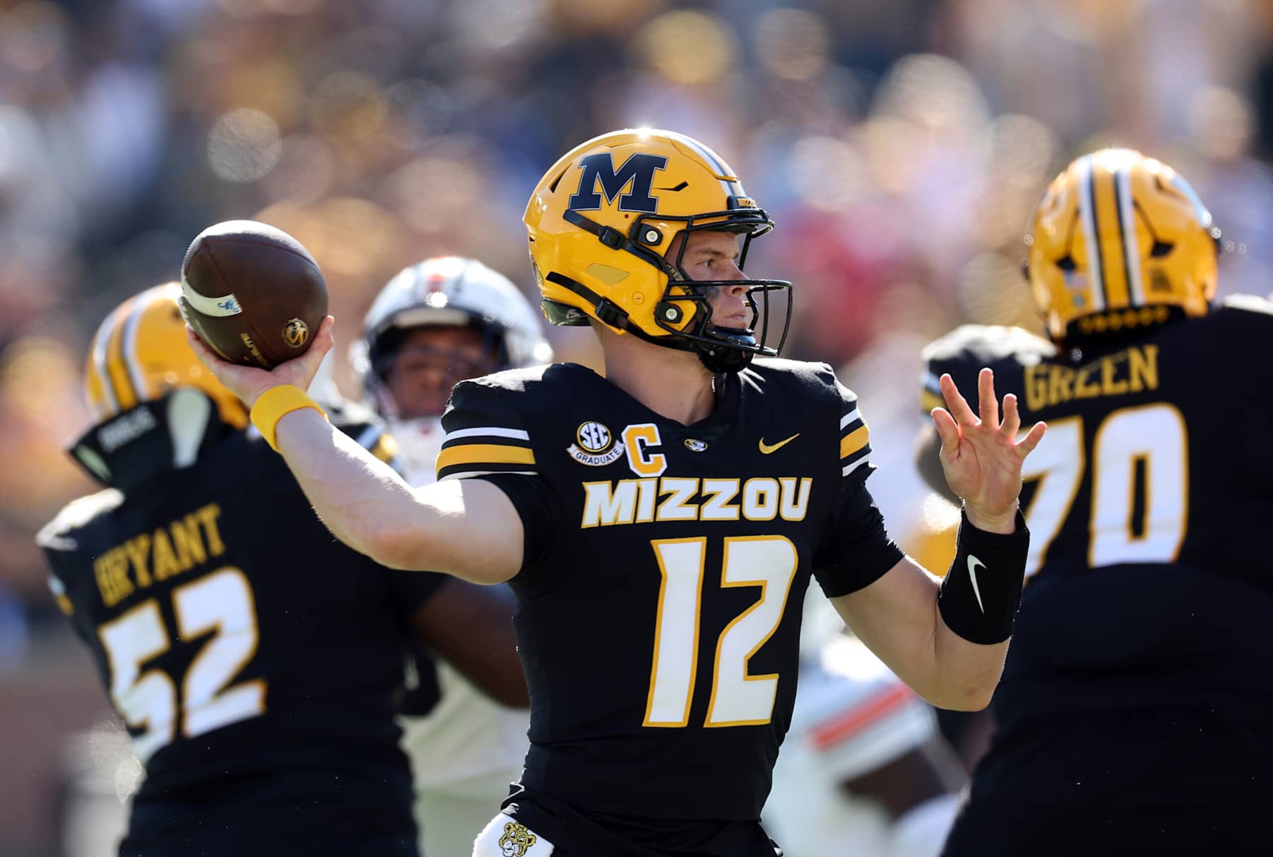 COLUMBIA, MISSOURI - OCTOBER 19: Brady Cook #12 of the Missouri Tigers passes during the 1st half of the game against the Auburn Tigers at Faurot Field/Memorial Stadium on October 19, 2024 in Columbia, Missouri. (Photo by Jamie Squire/Getty Images) COLUMBIA, MISSOURI - OCTOBER 19: Brady Cook #12 of the Missouri Tigers passes during the 1st half of the game against the Auburn Tigers at Faurot Field/Memorial Stadium on October 19, 2024 in Columbia, Missouri. (Photo by Jamie Squire/Getty Images)