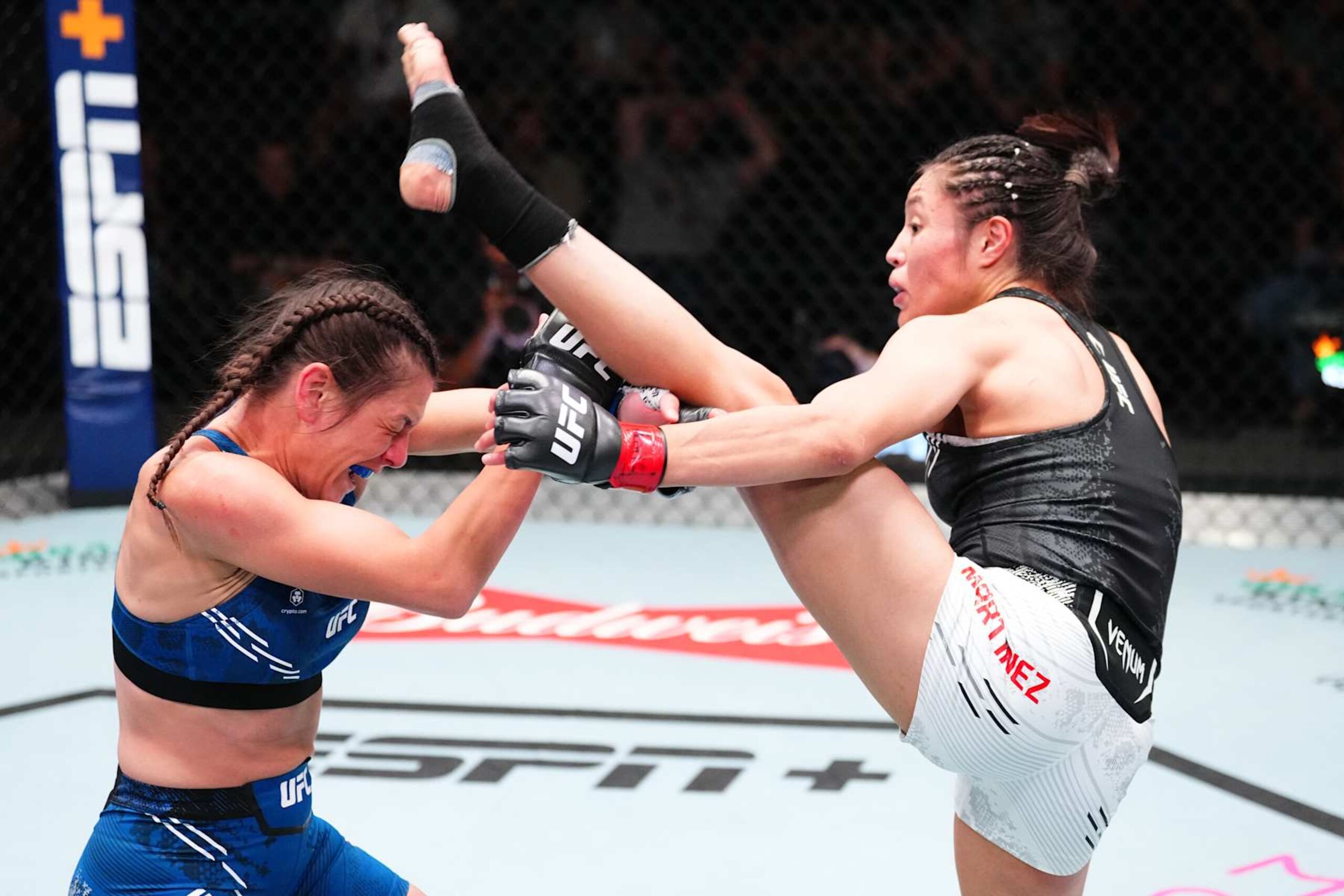 LAS VEGAS, NEVADA - OCTOBER 19: (R-L) Melissa Martinez of Mexico kicks Alice Ardelean of Romania in a strawweight fight during the UFC Fight Night event at UFC APEX on October 19, 2024 in Las Vegas, Nevada.  (Photo by Jeff Bottari/Zuffa LLC)