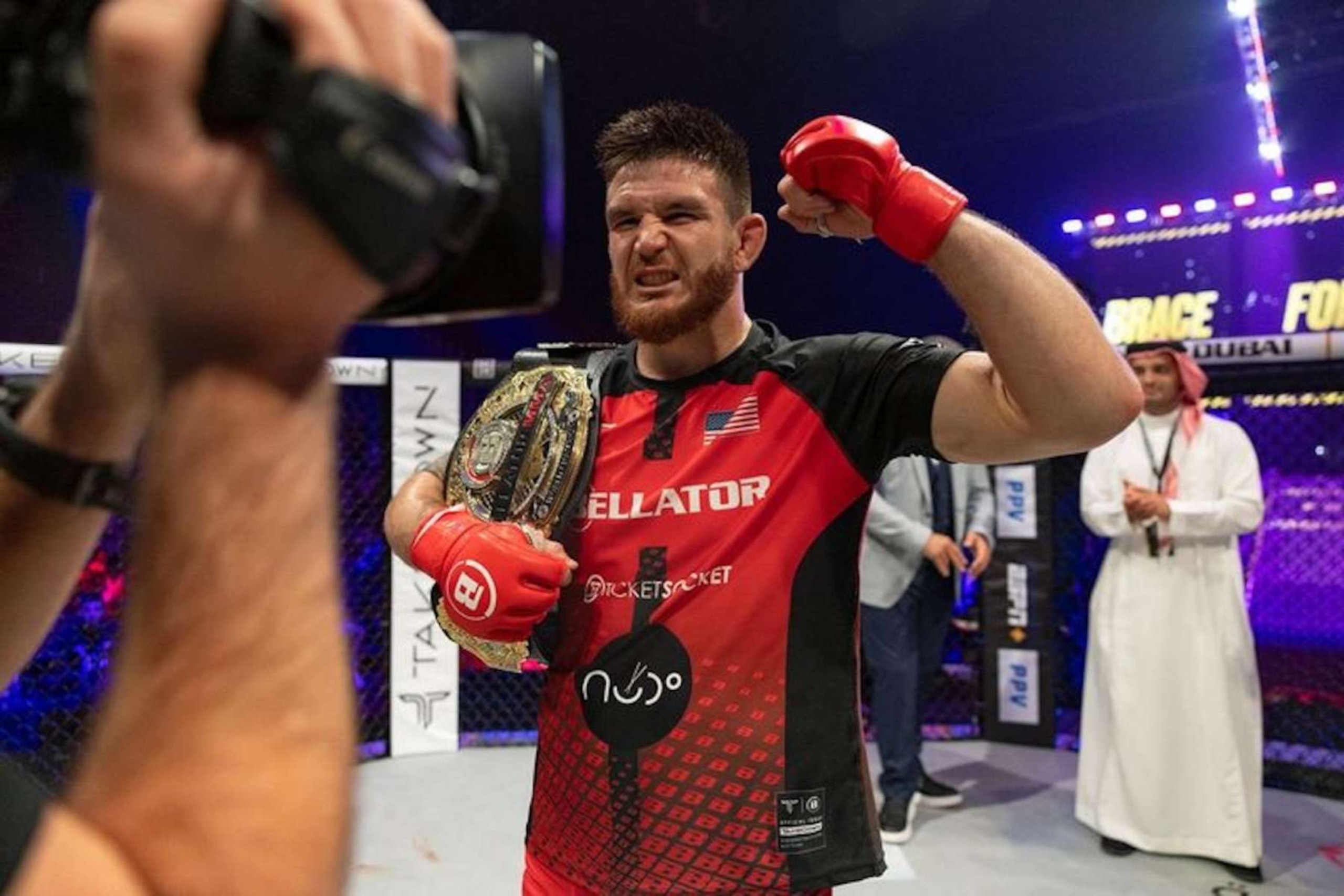 Johnny Eblen celebrates a title defense against Fabian Edwards.