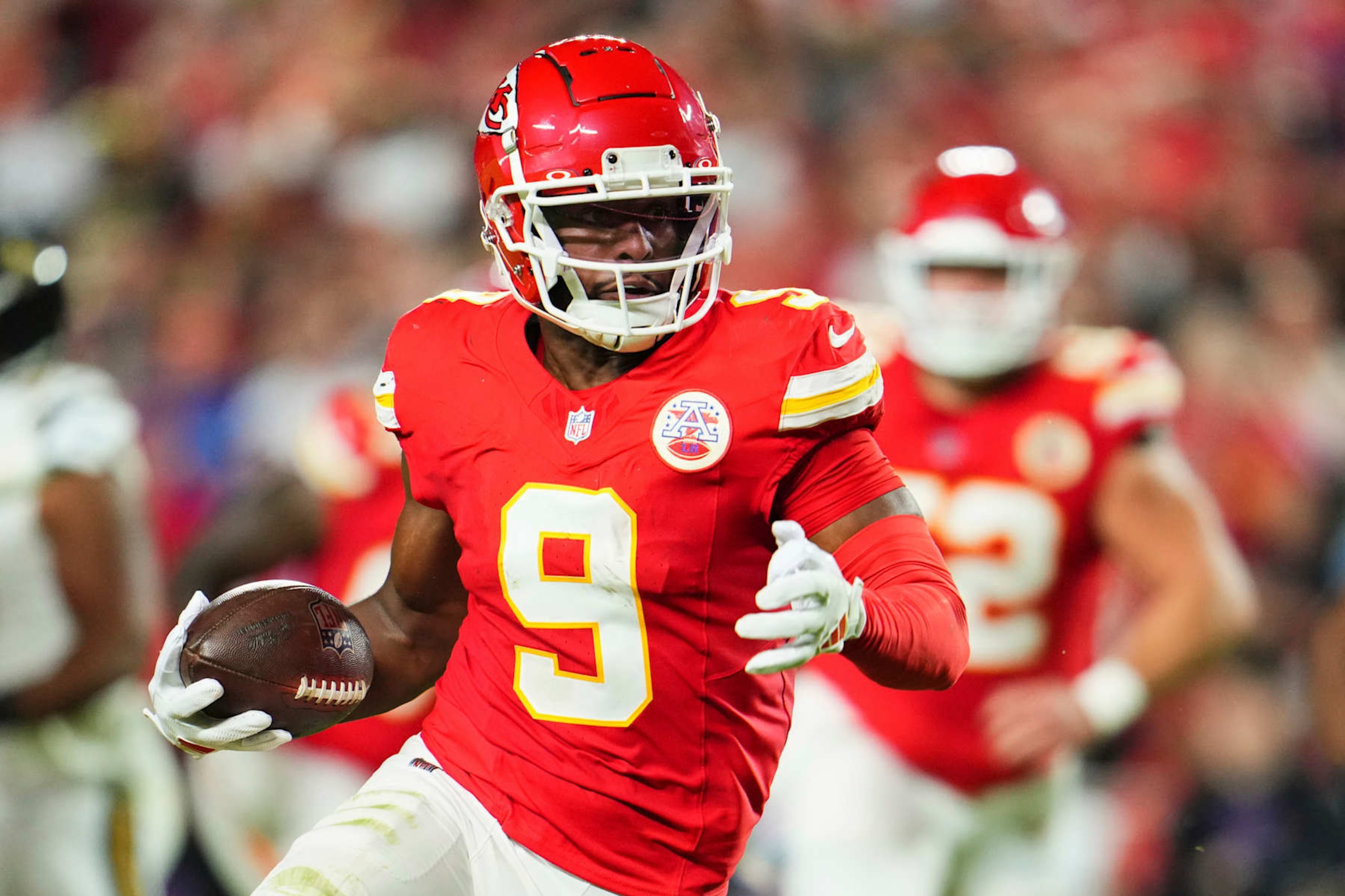 KANSAS CITY, MO - OCTOBER 07: JuJu Smith-Schuster #9 of the Kansas City Chiefs runs with the ball against the New Orleans Saints during the first half of an NFL football game at GEHA Field at Arrowhead Stadium on October 7, 2024 in Kansas City, Missouri. (Photo by Cooper Neill/Getty Images)