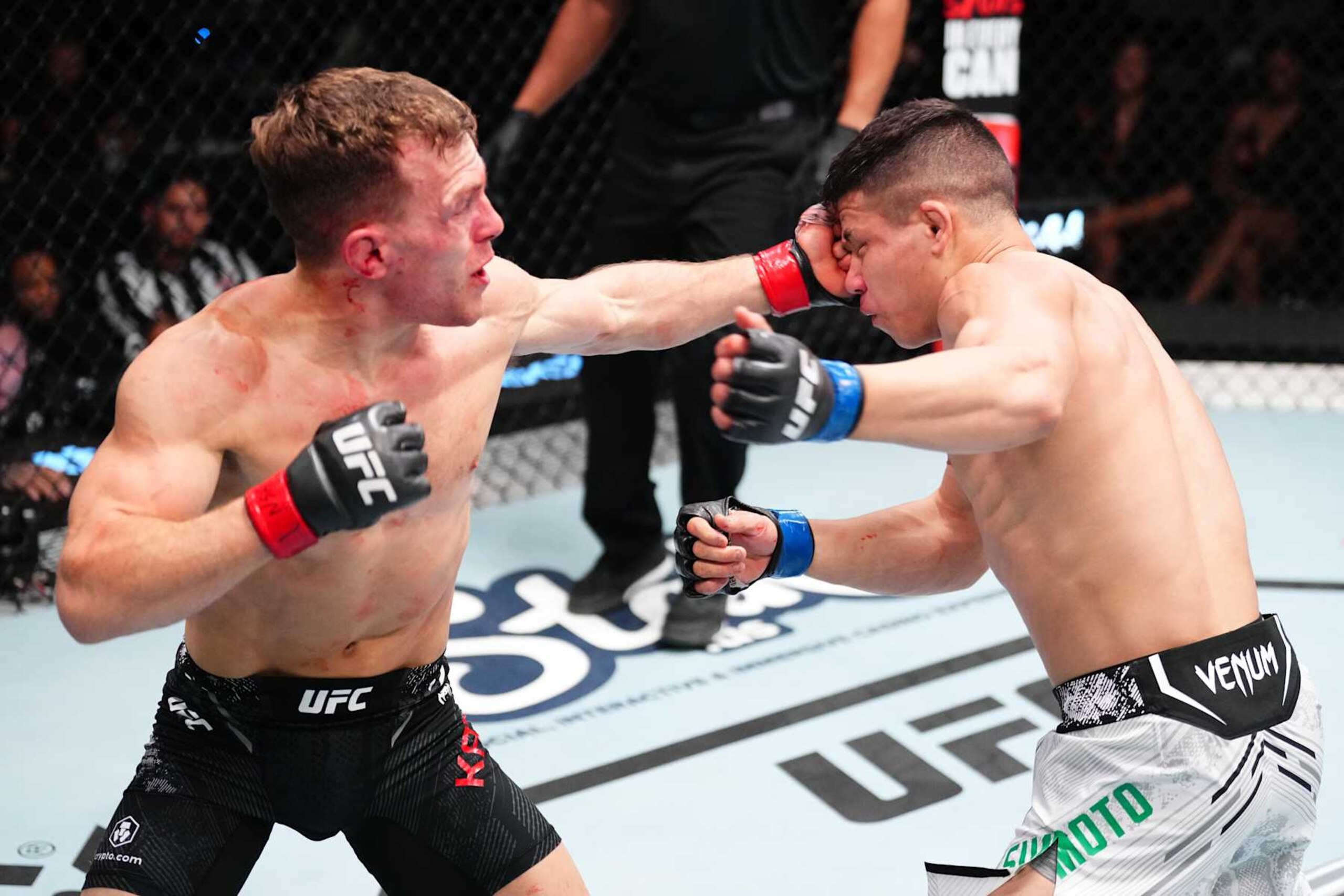 LAS VEGAS, NEVADA - OCTOBER 19: (L-R) Brad Katona of Canada punches Jean Matsumoto of Brazil in a bantamweight fight during the UFC Fight Night event at UFC APEX on October 19, 2024 in Las Vegas, Nevada.  (Photo by Jeff Bottari/Zuffa LLC)