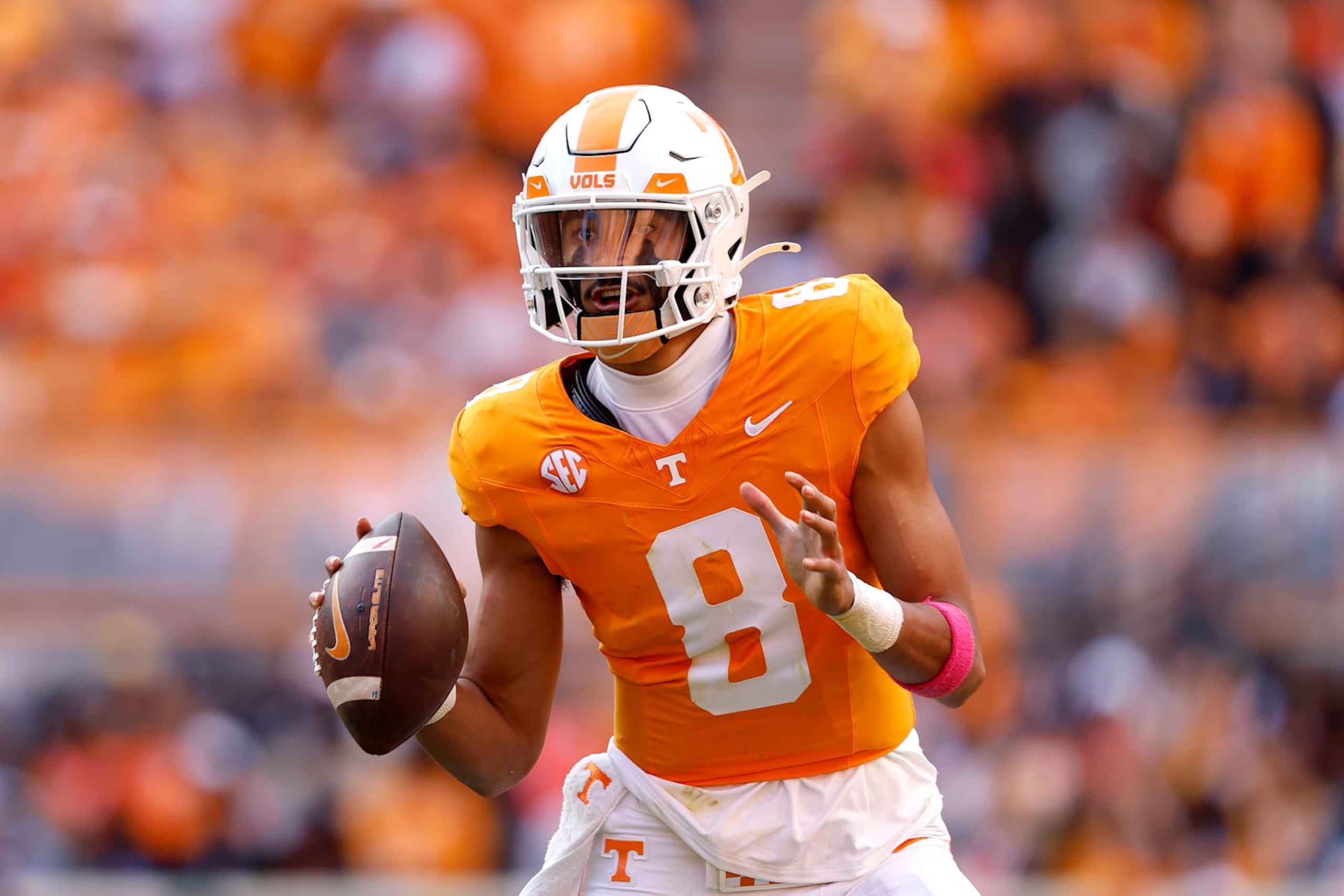 KNOXVILLE, TENNESSEE - OCTOBER 19: Nico Iamaleava #8 of the Tennessee Volunteers looks to throw the ball during the second quarter against the Alabama Crimson Tide at Nissan Stadium on October 19, 2024 in Nashville, Tennessee. (Photo by Butch Dill/Getty Images)