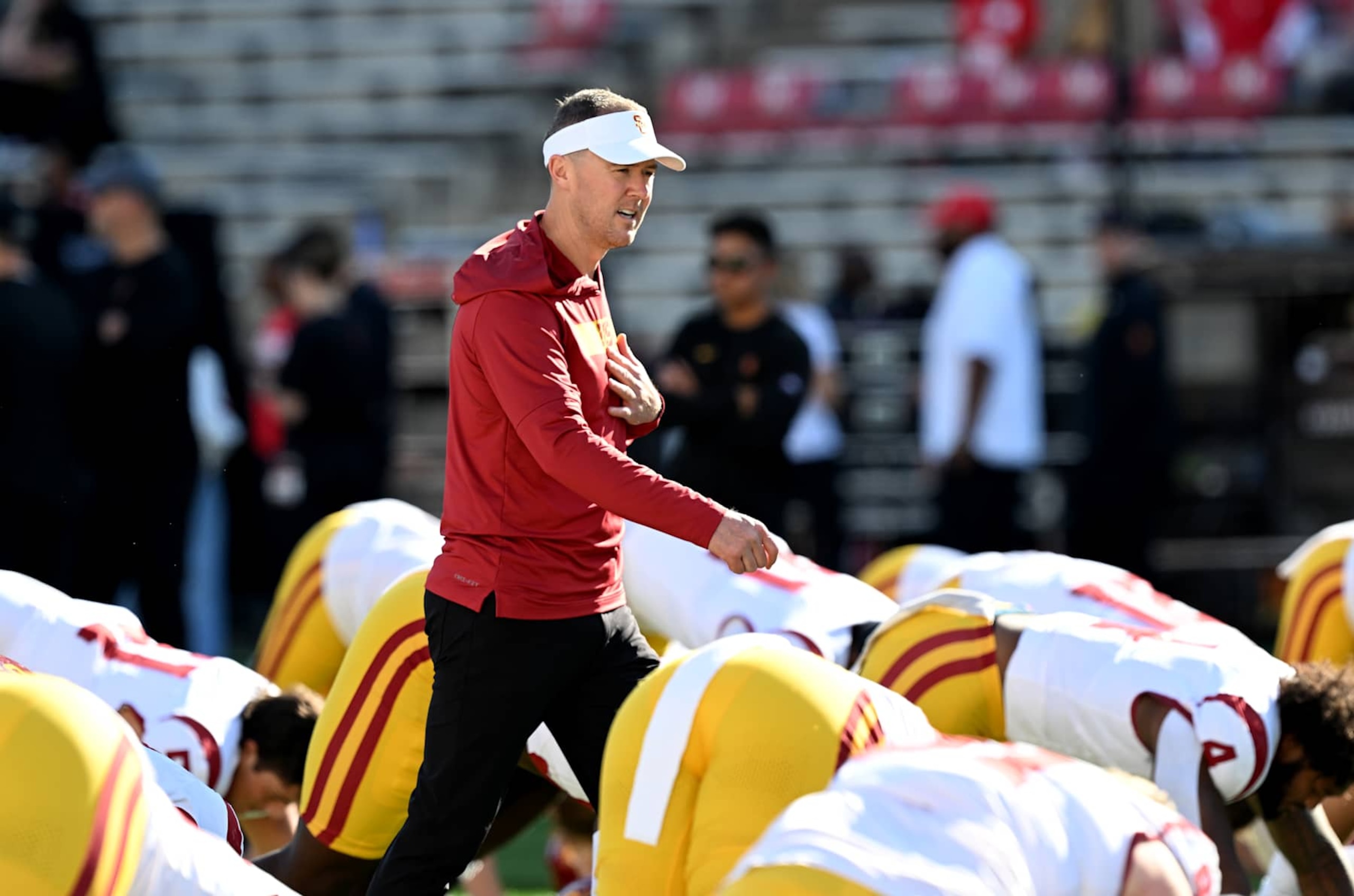 COLLEGE PARK, MARYLAND - OCTOBER 19: Head coach Lincoln Riley of the USC Trojans watches his team warm up before the game against at Maryland Terrapins at SECU Stadium on October 19, 2024 in College Park, Maryland. (Photo by Greg Fiume/Getty Images)