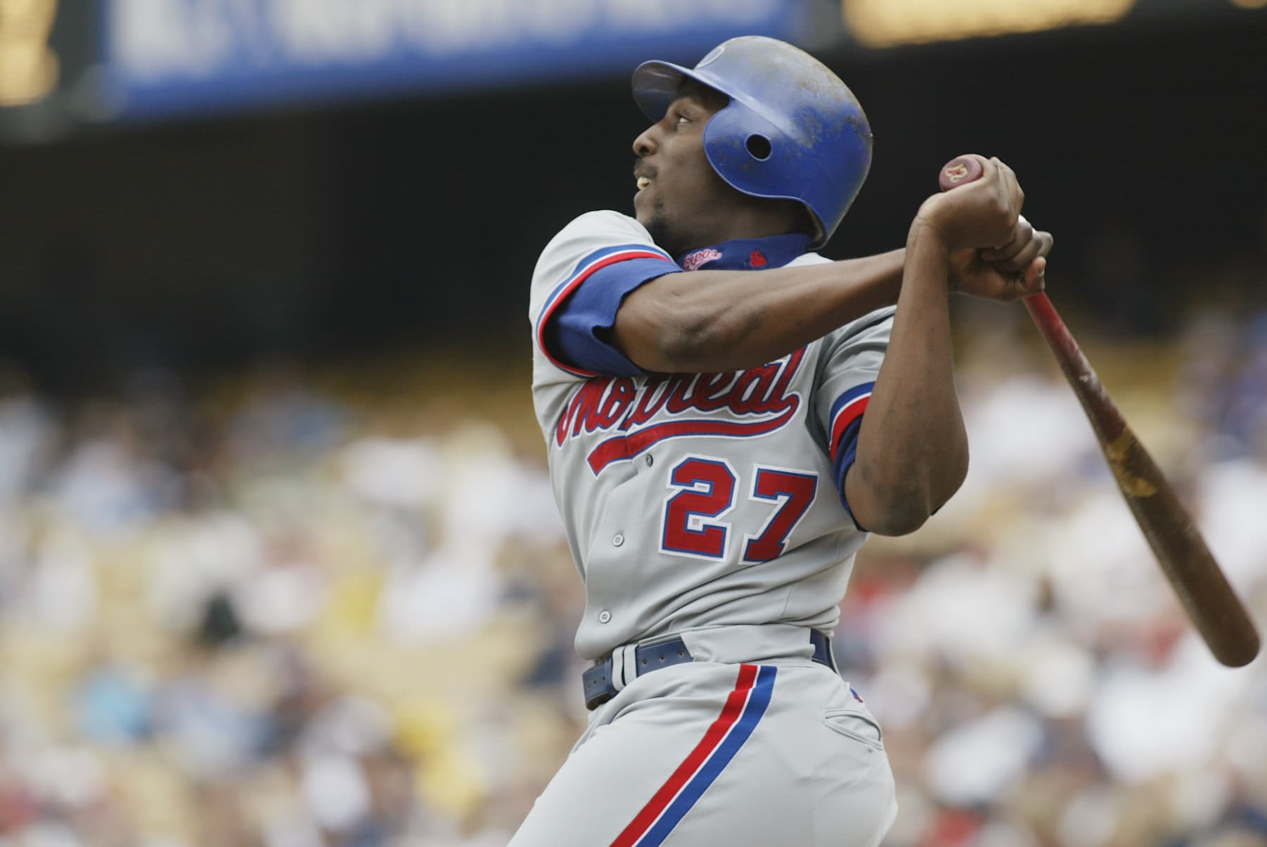 LOS ANGELES - MAY 19:  Right fielder Vladimir Guerrero #27 of the Montreal Expos swings the bat during the MLB game against the Los Angeles Dodgers at Dodger Stadium in Los Angeles, California on May 19, 2002.  The Dodgers won 10-1. (Photo by Stephen Dunn/Getty Images)