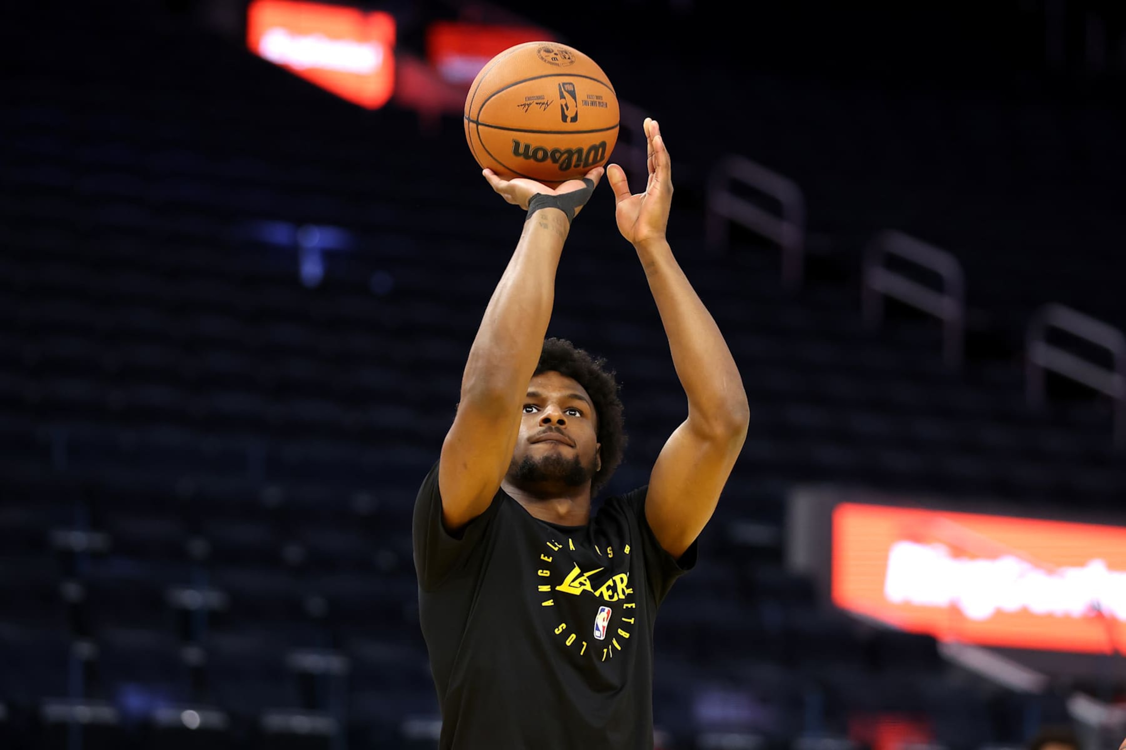 SAN FRANCISCO, CALIFORNIA - OCTOBER 18: Bronny James #9 of the Los Angeles Lakers warms up before their preseason game against the Golden State Warriors at Chase Center on October 18, 2024 in San Francisco, California. NOTE TO USER: User expressly acknowledges and agrees that, by downloading and/or using this photograph, user is consenting to the terms and conditions of the Getty Images License Agreement. (Photo by Ezra Shaw/Getty Images) SAN FRANCISCO, CALIFORNIA - OCTOBER 18: Bronny James #9 of the Los Angeles Lakers warms up before their preseason game against the Golden State Warriors at Chase Center on October 18, 2024 in San Francisco, California. NOTE TO USER: User expressly acknowledges and agrees that, by downloading and/or using this photograph, user is consenting to the terms and conditions of the Getty Images License Agreement. (Photo by Ezra Shaw/Getty Images)