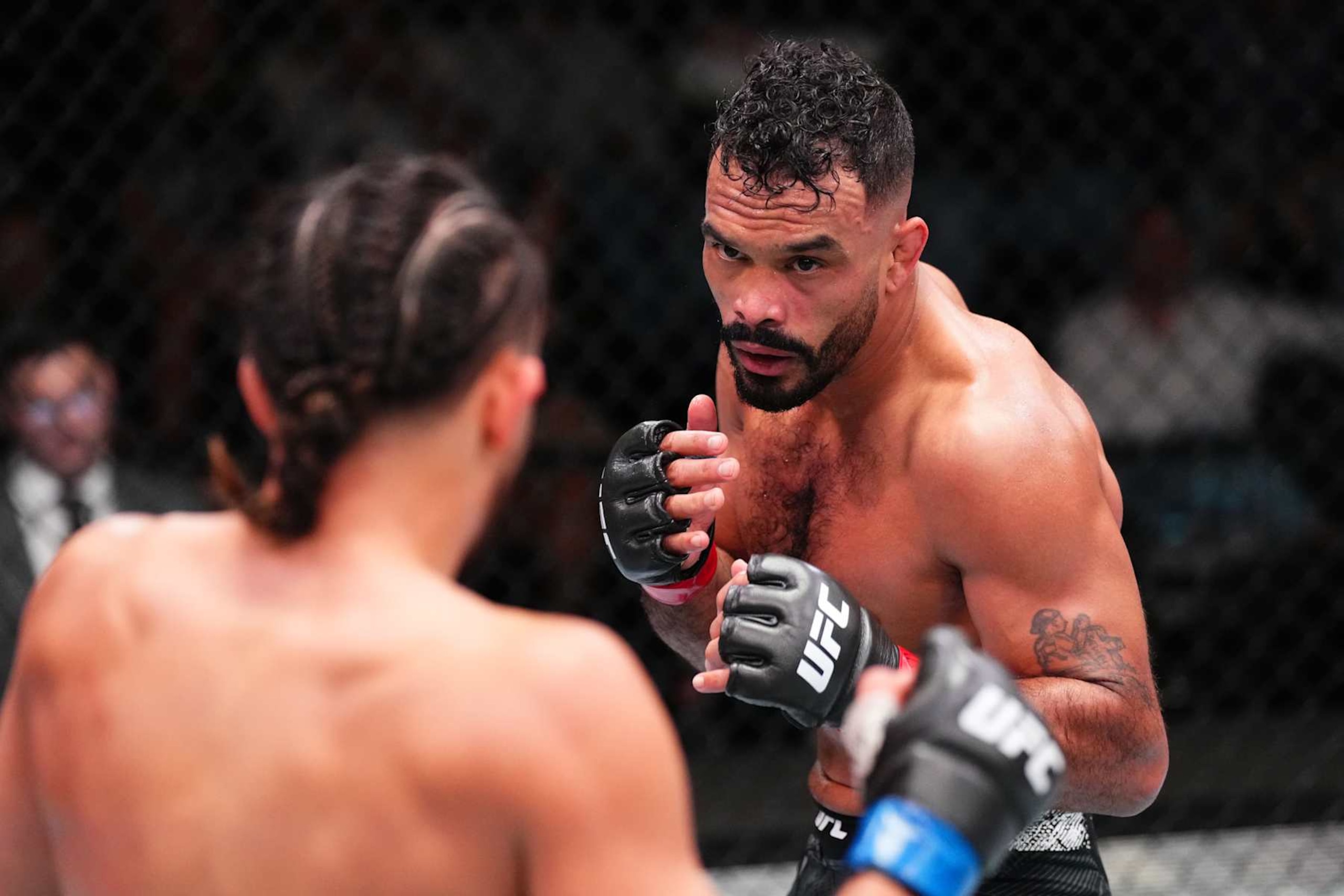 LAS VEGAS, NEVADA - OCTOBER 19: (R-L) Rob Font battles Kyler Phillips in a bantamweight fight during the UFC Fight Night event at UFC APEX on October 19, 2024 in Las Vegas, Nevada.  (Photo by Jeff Bottari/Zuffa LLC)