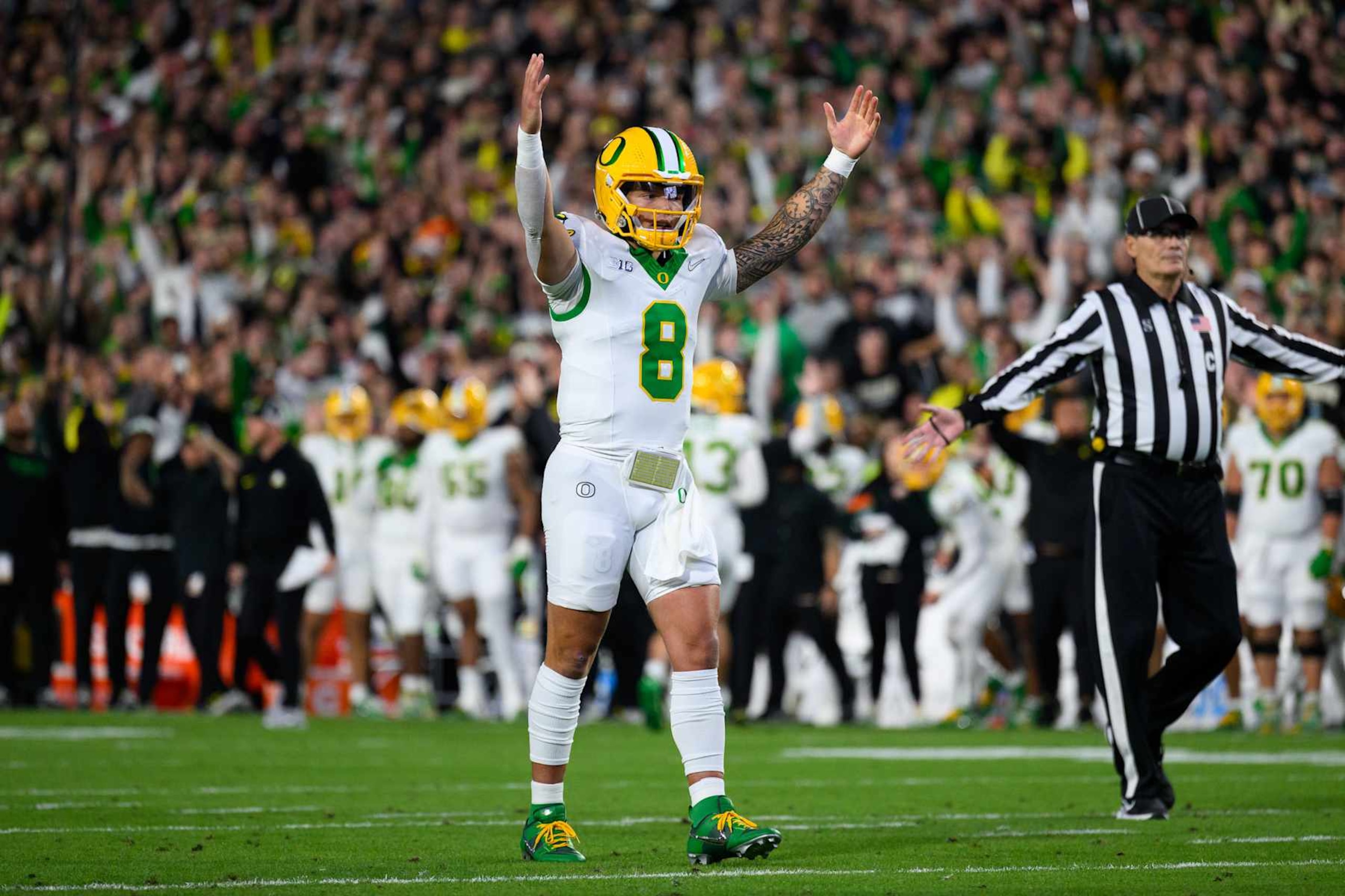 WEST LAFAYETTE, IN - OCTOBER 18: Oregon Ducks quarterback Dillon Gabriel (8) celebrates a touchdown during the college football game between the Purdue Boilermakers and Oregon Ducks on October 18, 2024, at Ross-Ade Stadium in West Lafayette, IN. (Photo by Zach Bolinger/Icon Sportswire via Getty Images)