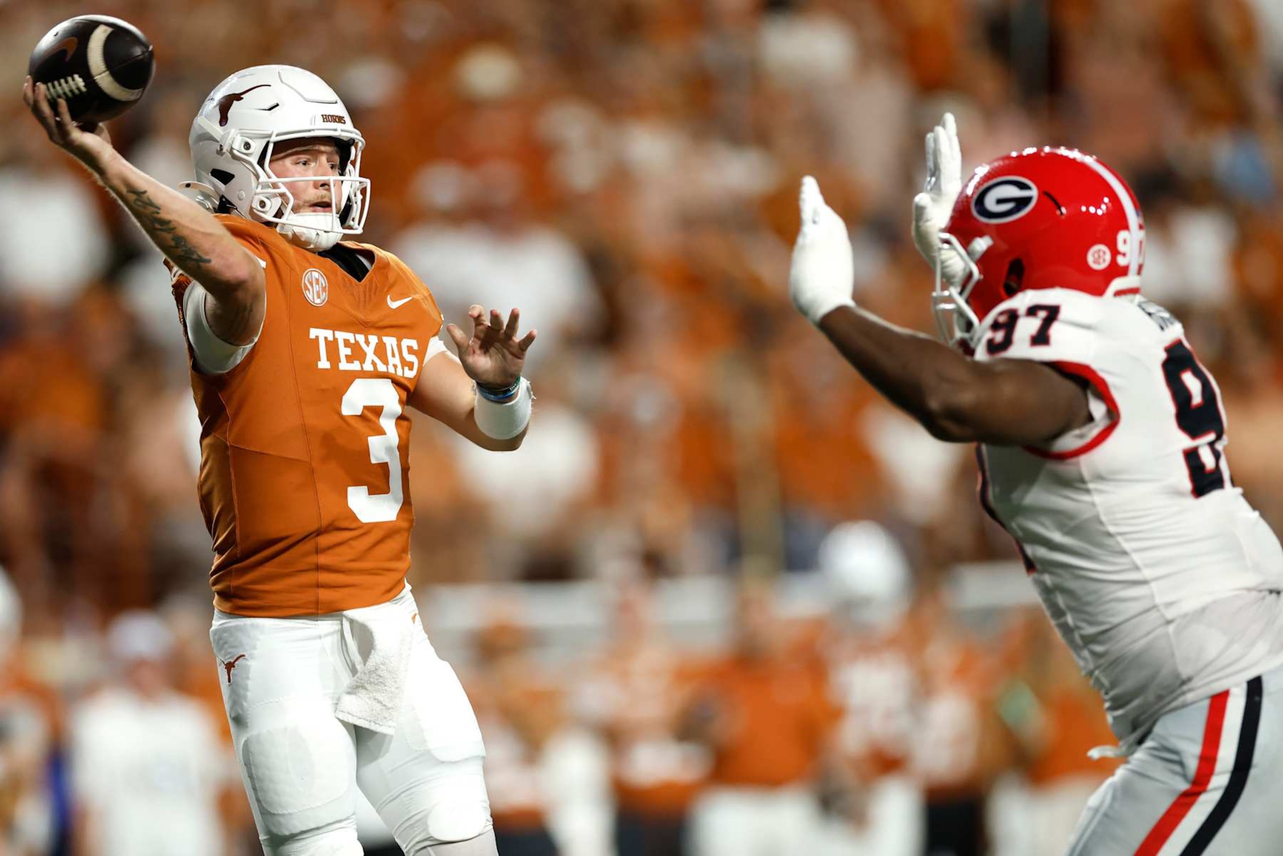 AUSTIN, TEXAS - OCTOBER 19: Quinn Ewers #3 of the Texas Longhorns throws the ball during the second quarter against the Georgia Bulldogs at Darrell K Royal-Texas Memorial Stadium on October 19, 2024 in Austin, Texas. (Photo by Tim Warner/Getty Images)