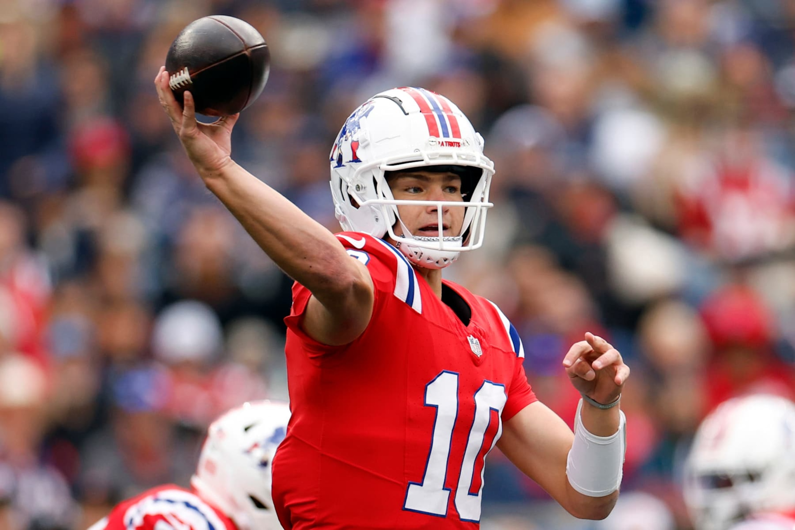 Foxborough, MA - October 13: New England Patriots QB Drake Maye throws a pass in the second quarter. (Photo by Danielle Parhizkaran/The Boston Globe via Getty Images)