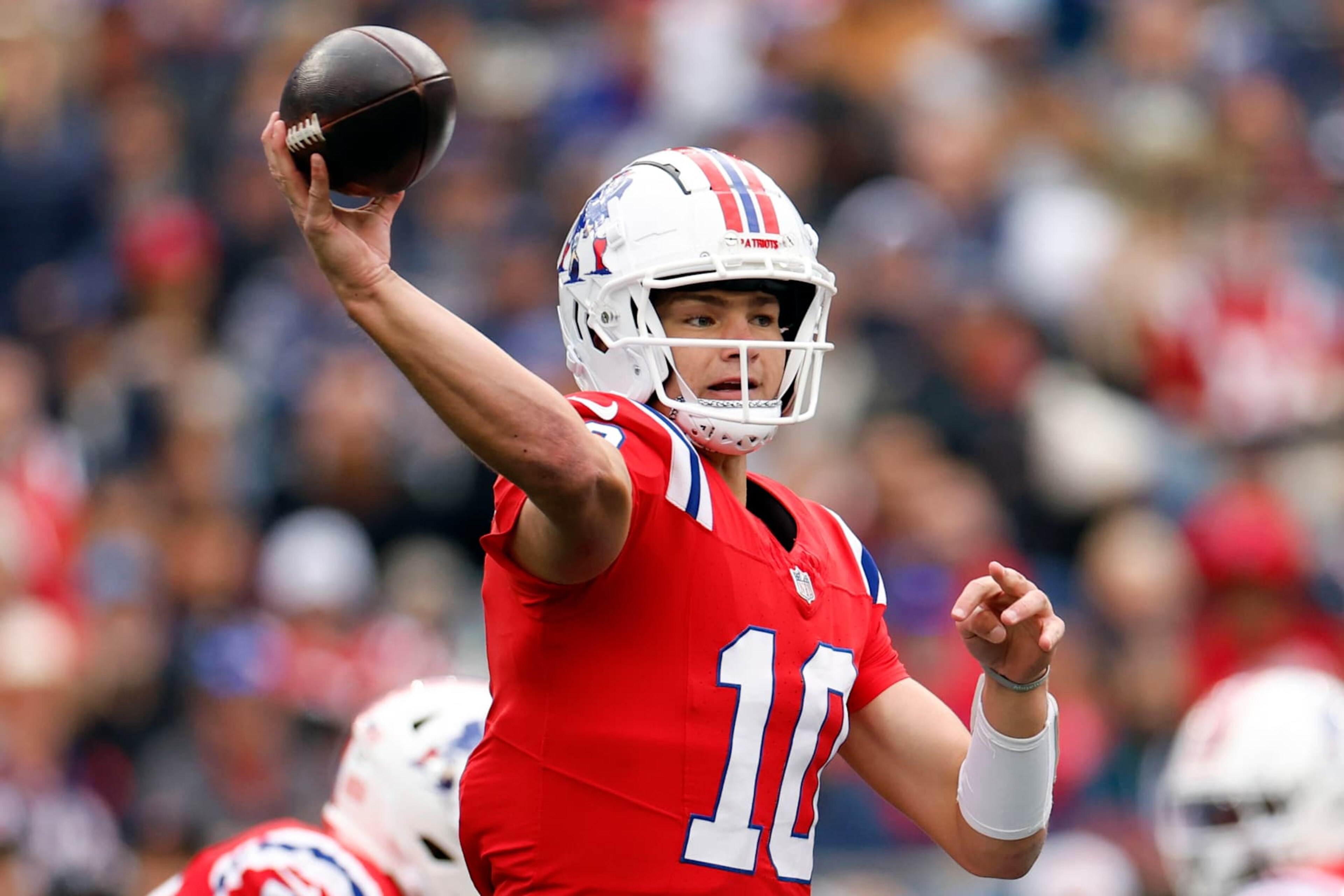 Foxborough, MA - October 13: New England Patriots QB Drake Maye throws a pass in the second quarter. (Photo by Danielle Parhizkaran/The Boston Globe via Getty Images)