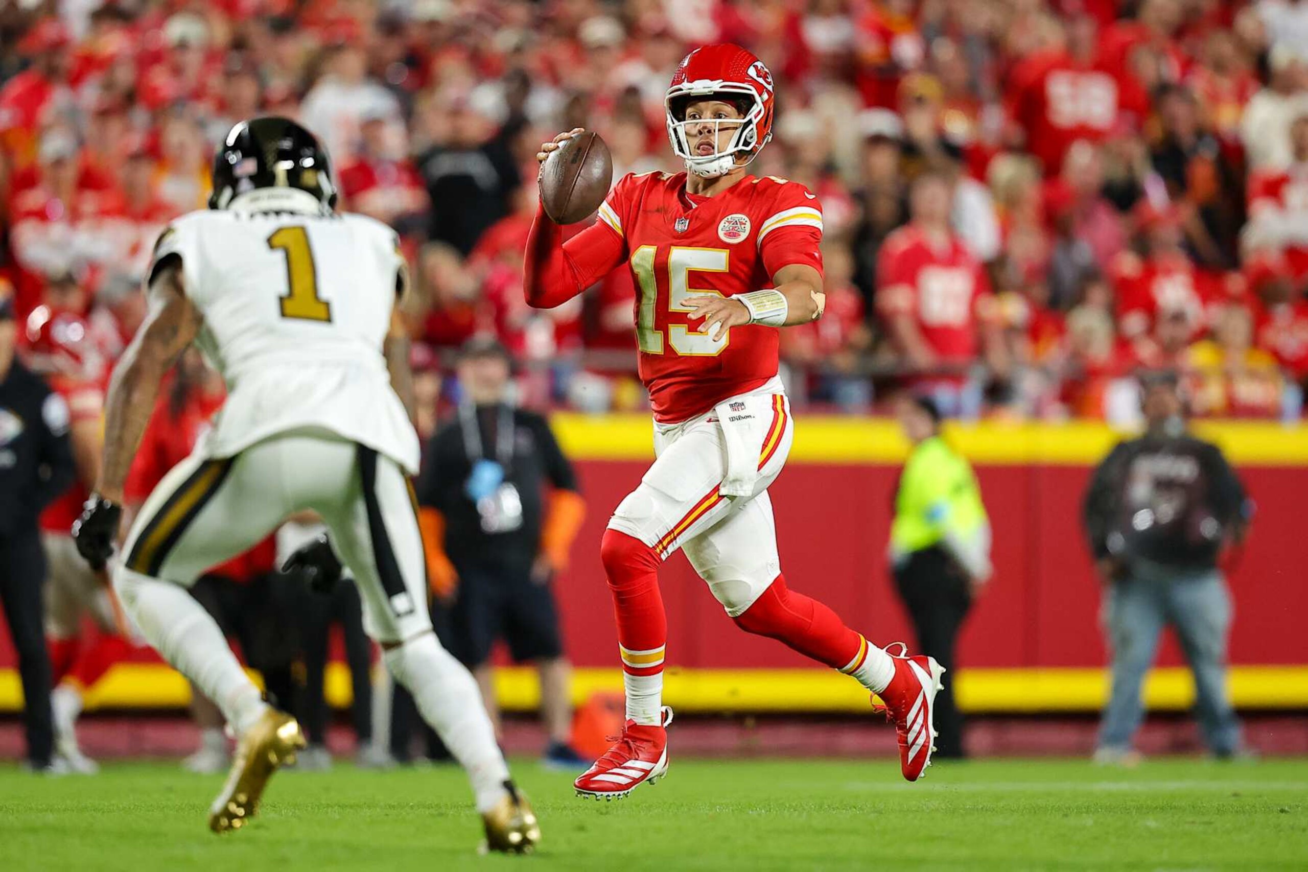 KANSAS CITY, MISSOURI - OCTOBER 7: Patrick Mahomes #15 of the Kansas City Chiefs scrambles for yardage during the second quarter against the New Orleans Saints at GEHA Field at Arrowhead Stadium on October 7, 2024 in Kansas City, Missouri. (Photo by David Eulitt/Getty Images)