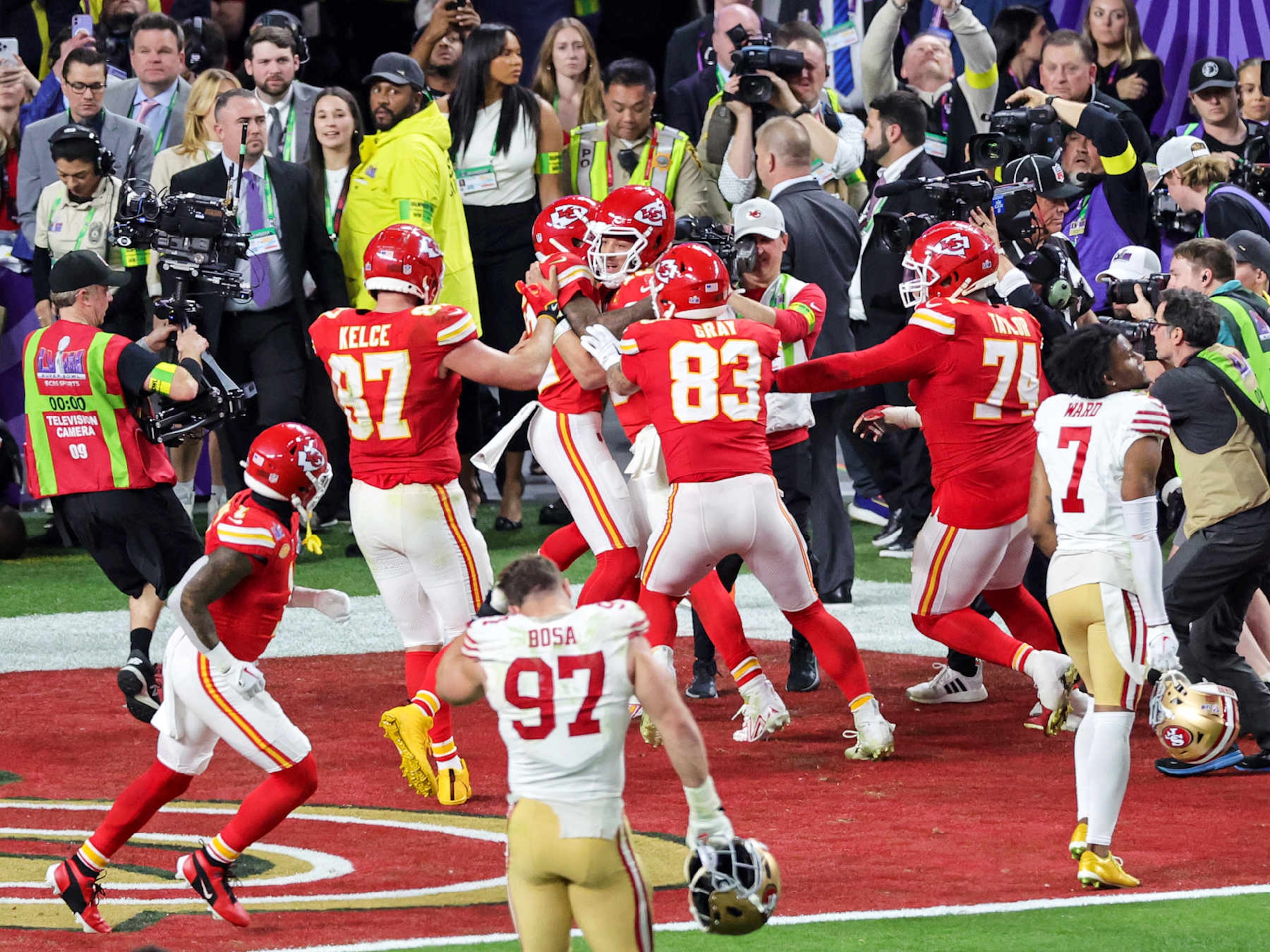 LAS VEGAS, NEVADA - FEBRUARY 11: Tight end Travis Kelce #87, wide receiver Mecole Hardman Jr. #12, quarterback Patrick Mahomes #15, tight end Noah Gray #83 and offensive tackle Jawaan Taylor #74 of the Kansas City Chiefs celebrate after Mahomes hit Hardman on a 3-yard touchdown pass in overtime against the San Francisco 49ers to win Super Bowl LVIII at Allegiant Stadium on February 11, 2024 in Las Vegas, Nevada. The Chiefs defeated the 49ers 25-22 in overtime. (Photo by Ethan Miller/Getty Images)