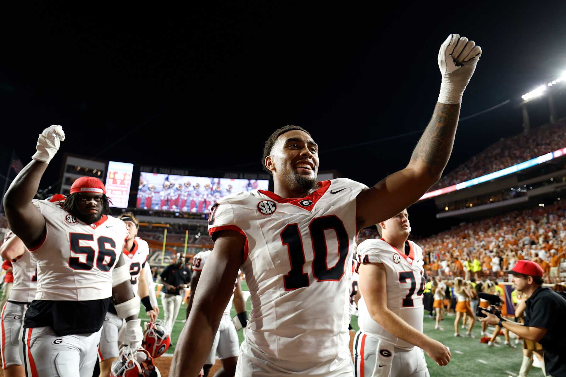 AUSTIN, TEXAS - OCTOBER 19: Damon Wilson II #10 of the Georgia Bulldogs and teammates celebrate after defeating the Texas Longhorns 30-15 at Darrell K Royal-Texas Memorial Stadium on October 19, 2024 in Austin, Texas. (Photo by Tim Warner/Getty Images)