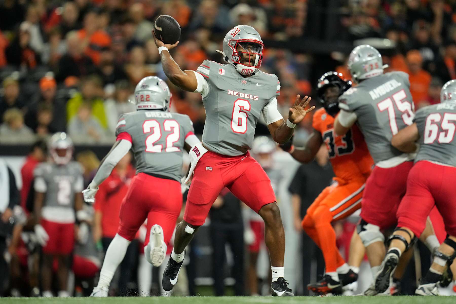 CORVALLIS, OREGON - OCTOBER 19: Hajj-Malik Williams #6 of the UNLV Rebels throws the ball during the first half against the Oregon State Beavers at Reser Stadium on October 19, 2024 in Corvallis, Oregon. (Photo by Soobum Im/Getty Images)