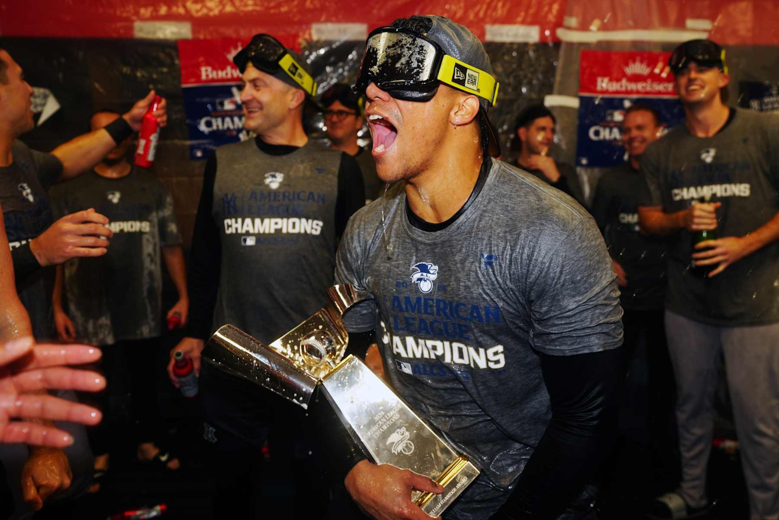 CLEVELAND, OH - OCTOBER 19: Juan Soto #22 of the New York Yankees celebrates in the clubhouse after the Yankees defeated the Cleveland Guardians in Game 5 of the ALCS presented by loanDepot to advance to the 2024 Major League Baseball World Series at Progressive Field on Saturday, October 19, 2024 in Cleveland, Ohio. (Photo by Mary DeCicco/MLB Photos via Getty Images) CLEVELAND, OH - OCTOBER 19: Juan Soto #22 of the New York Yankees celebrates in the clubhouse after the Yankees defeated the Cleveland Guardians in Game 5 of the ALCS presented by loanDepot to advance to the 2024 Major League Baseball World Series at Progressive Field on Saturday, October 19, 2024 in Cleveland, Ohio. (Photo by Mary DeCicco/MLB Photos via Getty Images)