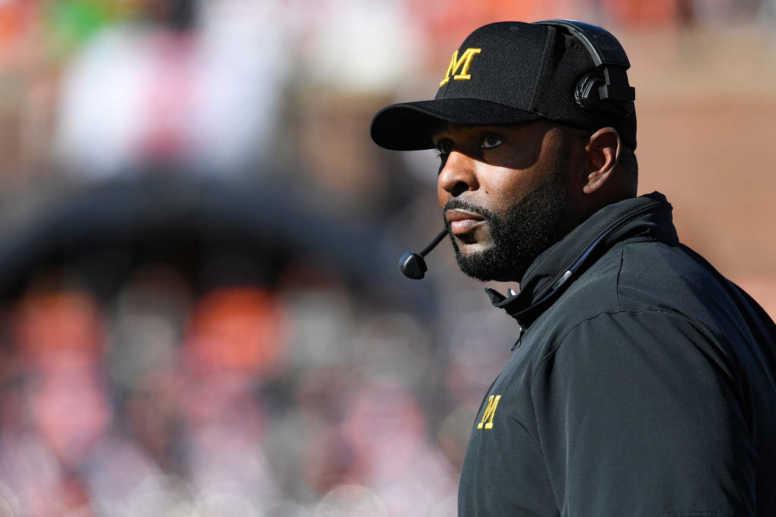 CHAMPAIGN, IL - OCTOBER 19: Michigan Wolverines Head Coach Sherrone Moore looks on during the college football game between the Michigan Wolverines and the Illinois Fighting Illini on October 19, 2024, at Memorial Stadium, in Champaign, Illinois. (Photo by Michael Allio/Icon Sportswire via Getty Images)