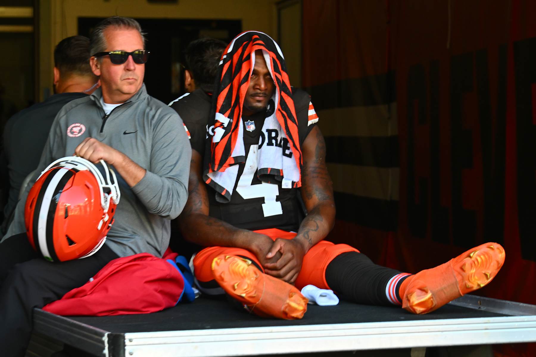 CLEVELAND, OHIO - OCTOBER 20: Deshaun Watson #4 of the Cleveland Browns is taken off the field on a medical cart in the second quarter of a game against the Cincinnati Bengalsat Huntington Bank Field on October 20, 2024 in Cleveland, Ohio. (Photo by Jason Miller/Getty Images)