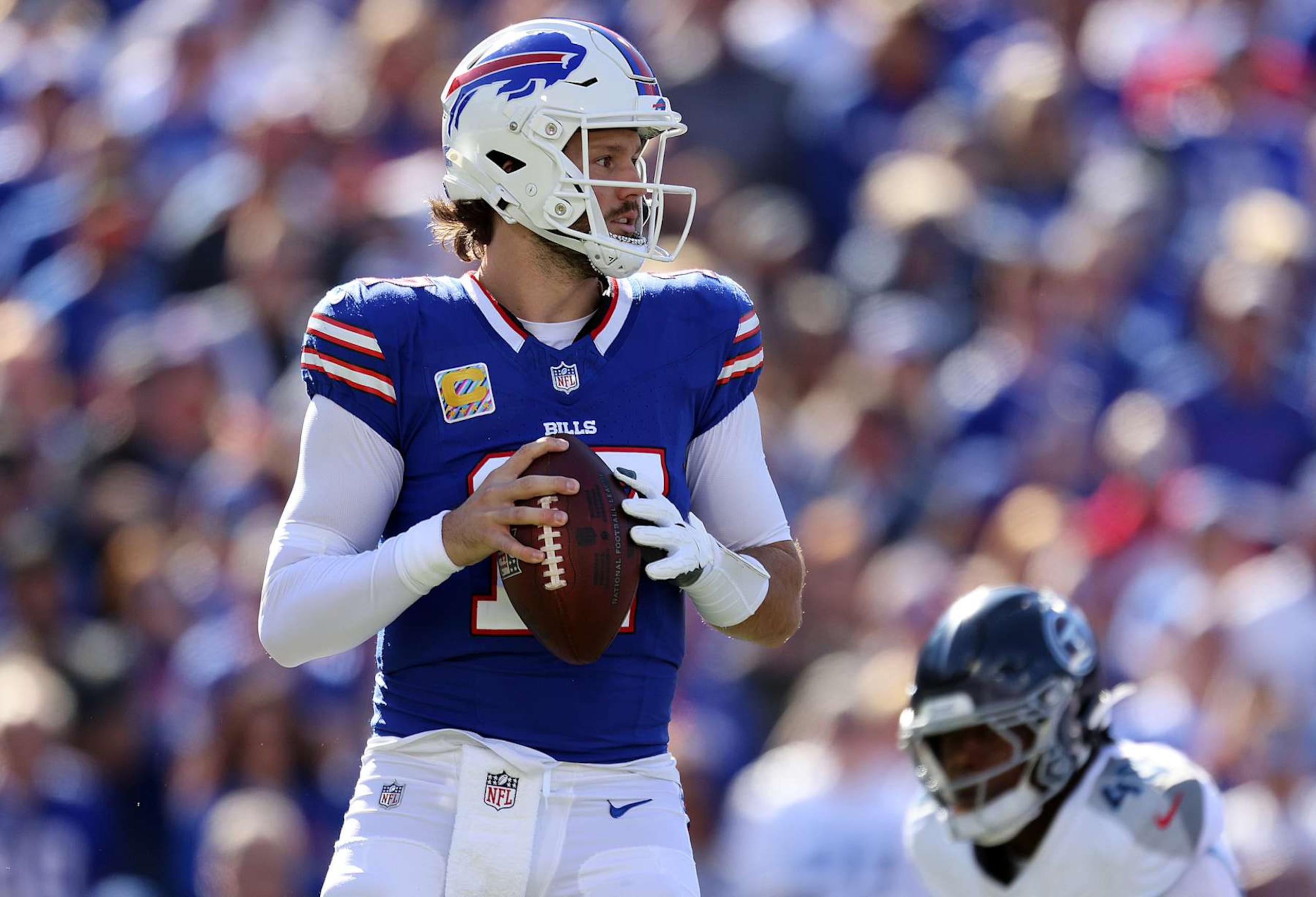 ORCHARD PARK, NEW YORK - OCTOBER 20: Josh Allen #17 of the Buffalo Bills looks to pass against the Tennessee Titans during the first quarter at Highmark Stadium on October 20, 2024 in Orchard Park, New York. (Photo by Bryan M. Bennett/Getty Images)