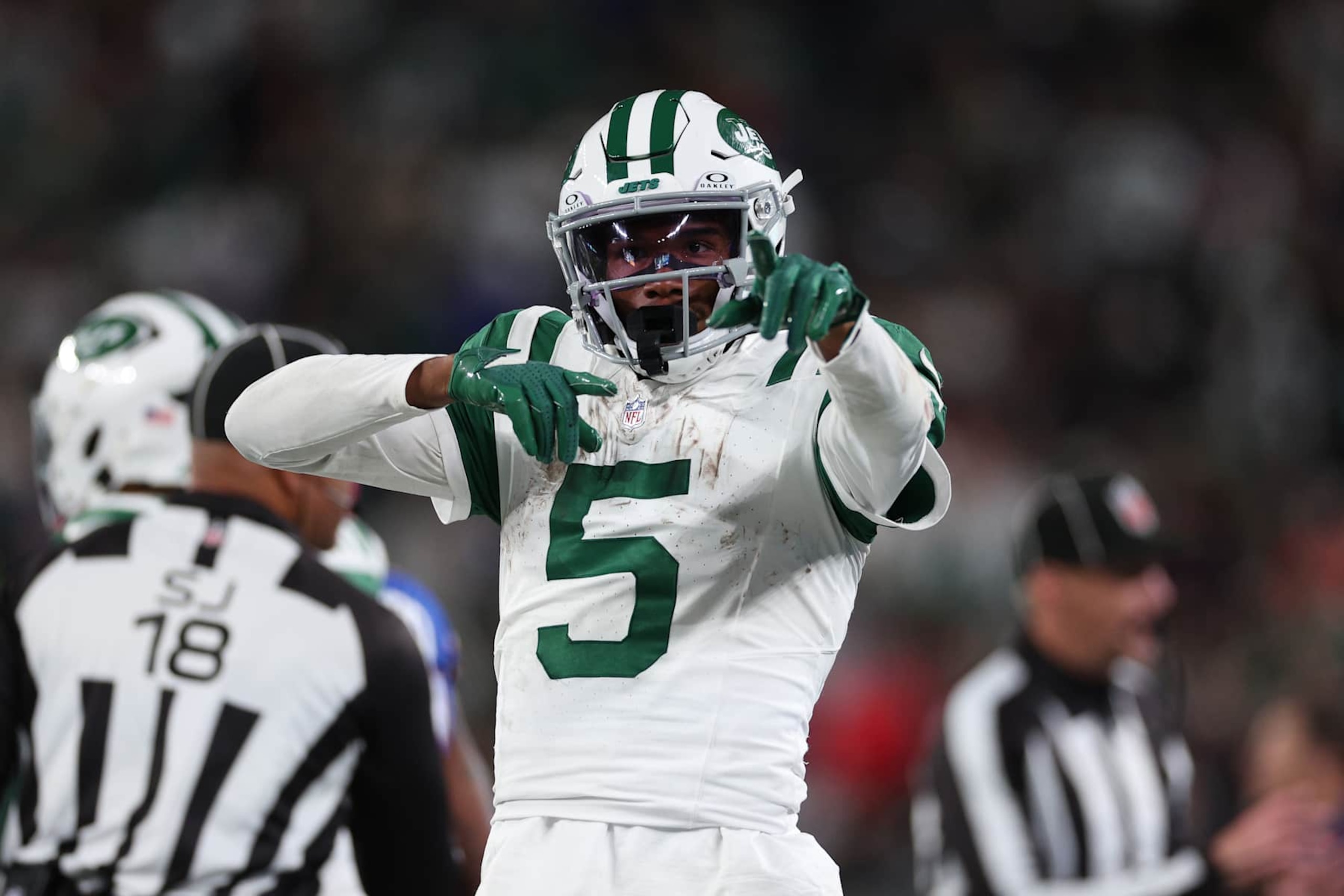 EAST RUTHERFORD, NEW JERSEY - OCTOBER 14: Garrett Wilson #5 of the New York Jets reacts after a first down during the third quarter against the Buffalo Bills at MetLife Stadium on October 14, 2024 in East Rutherford, New Jersey. (Photo by Elsa/Getty Images)