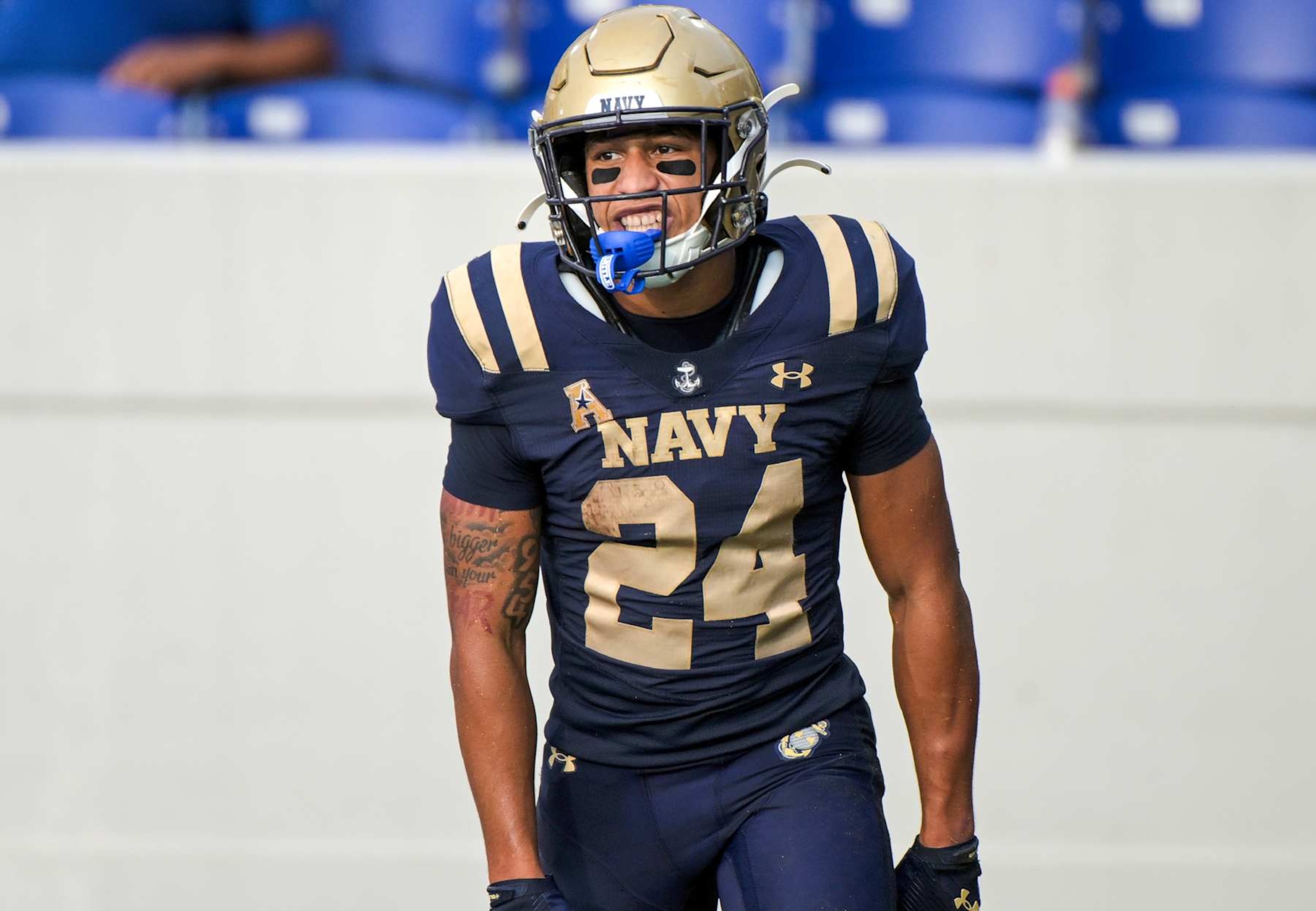 ANNAPOLIS, MD - SEPTEMBER 21:  Navy Midshipmen running back Brandon Chatman (24) celebrate his rushing touchdown during the Memphis Tigers game versus the Naval Academy Midshipmen on September 21, 2024 at Navy - Marine Corps Memorial Stadium in Annapolis, MD. (Photo by Mark Goldman/Icon Sportswire via Getty Images)