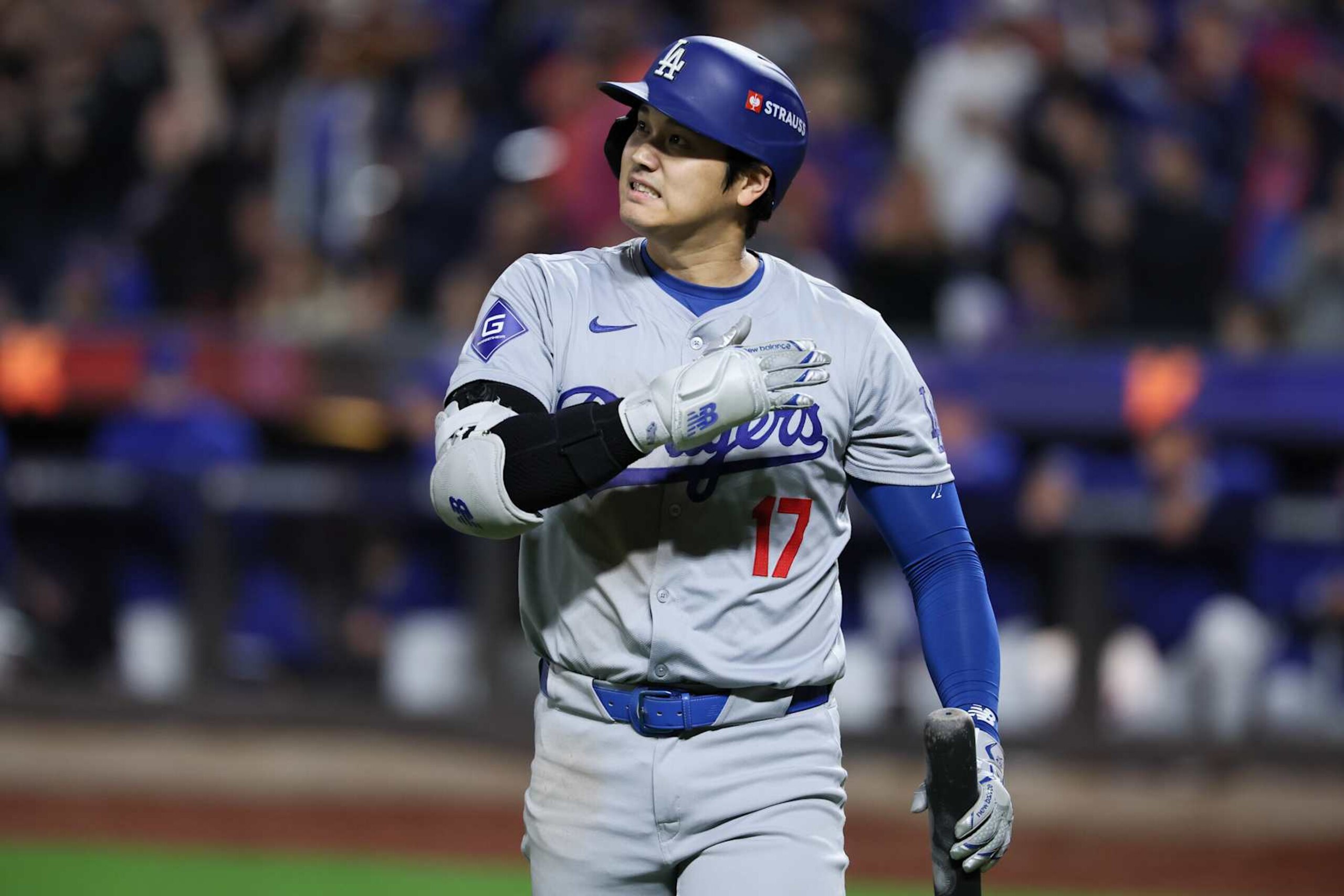 NEW YORK, NEW YORK - OCTOBER 18: Shohei Ohtani #17 of the Los Angeles Dodgers reacts after striking out during the fifth inning in game five of the National League Championship Series against the New York Mets at Citi Field on Friday, Oct. 18, 2024 in New York. (Robert Gauthier / Los Angeles Times via Getty Images) NEW YORK, NEW YORK - OCTOBER 18: Shohei Ohtani #17 of the Los Angeles Dodgers reacts after striking out during the fifth inning in game five of the National League Championship Series against the New York Mets at Citi Field on Friday, Oct. 18, 2024 in New York. (Robert Gauthier / Los Angeles Times via Getty Images)