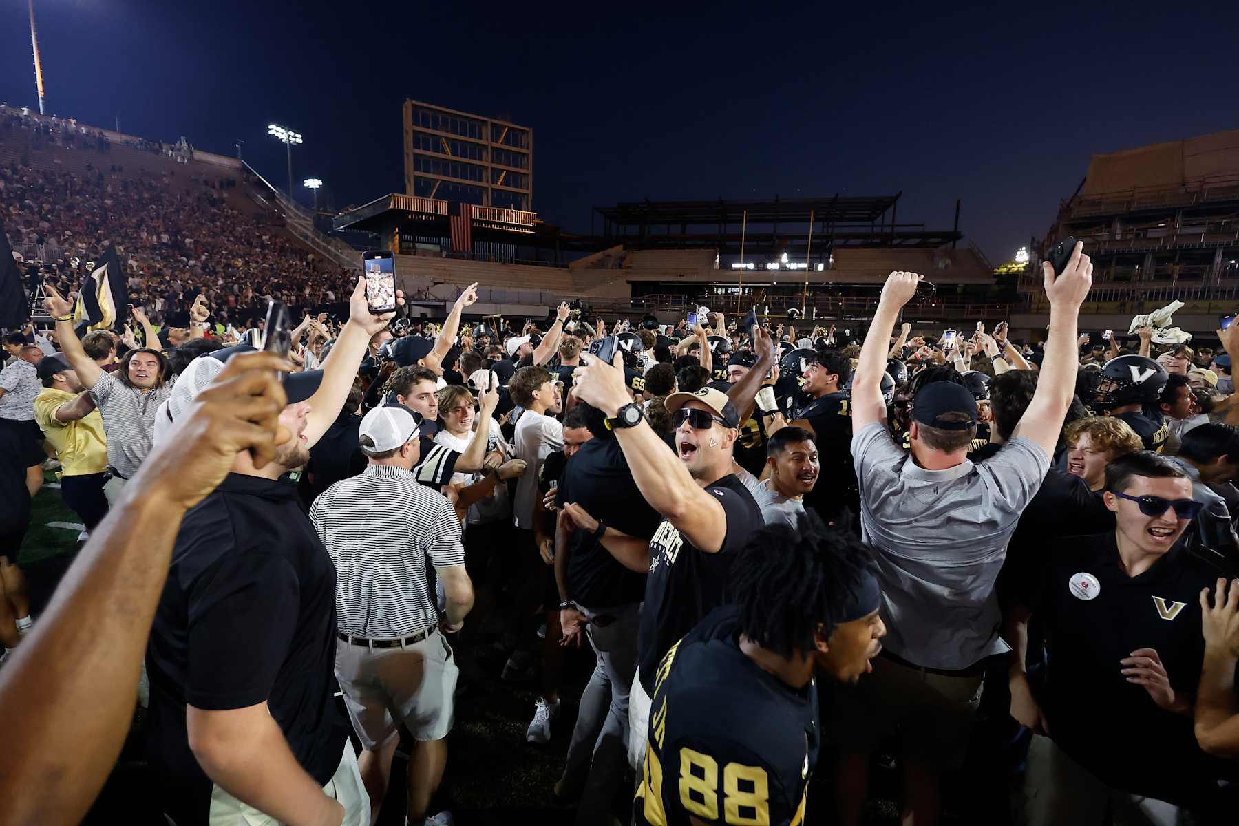 NASHVILLE, TN - OCTOBER 05: Vanderbilt Commodores fans rush the field following a game between the Vanderbilt Commodores and Alabama Crimson Tide, October 5, 2024 at FirstBank Stadium in Nashville, Tennessee. (Photo by Matthew Maxey/Icon Sportswire via Getty Images) NASHVILLE, TN - OCTOBER 05: Vanderbilt Commodores fans rush the field following a game between the Vanderbilt Commodores and Alabama Crimson Tide, October 5, 2024 at FirstBank Stadium in Nashville, Tennessee. (Photo by Matthew Maxey/Icon Sportswire via Getty Images)