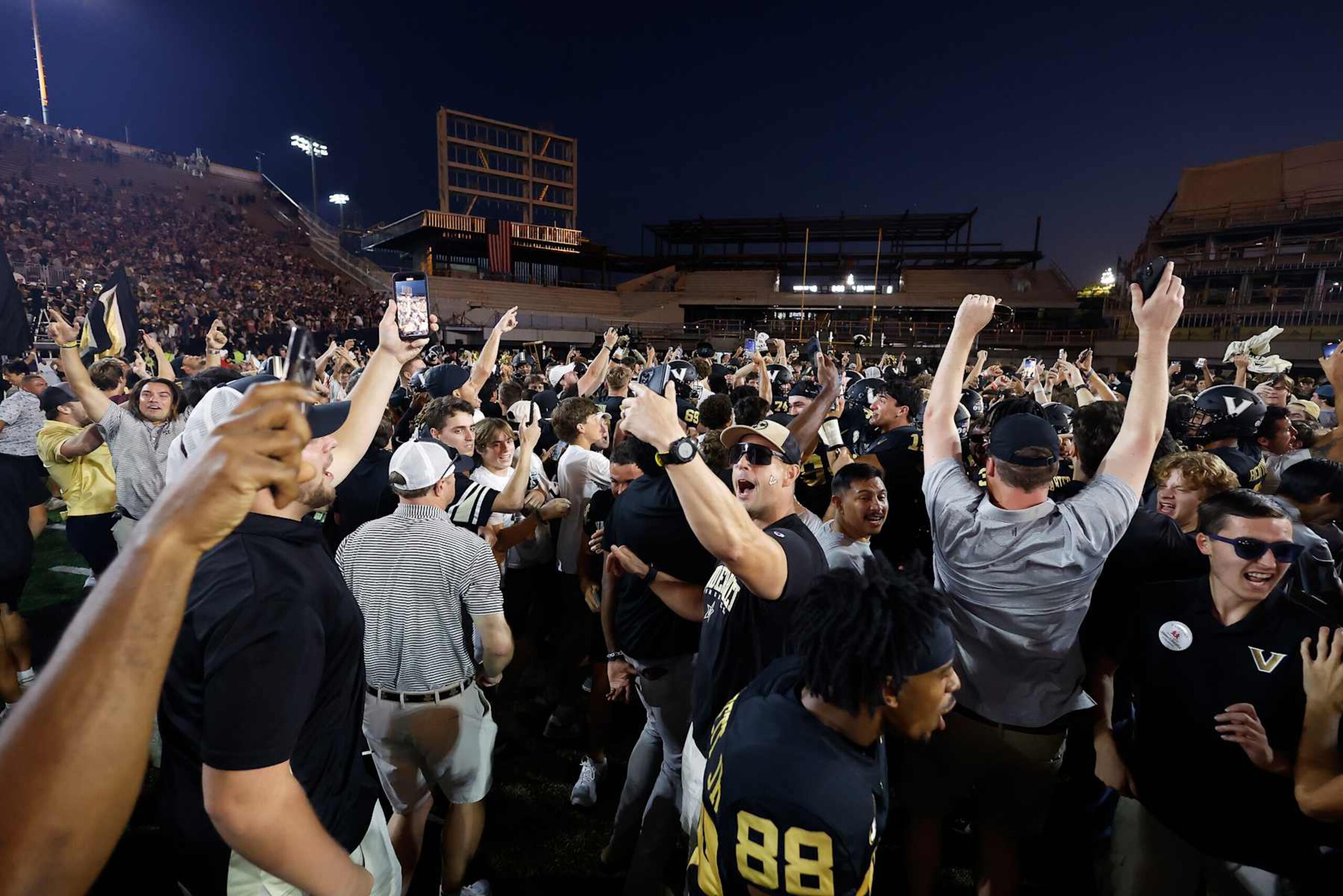 NASHVILLE, TN - OCTOBER 05: Vanderbilt Commodores fans rush the field following a game between the Vanderbilt Commodores and Alabama Crimson Tide, October 5, 2024 at FirstBank Stadium in Nashville, Tennessee. (Photo by Matthew Maxey/Icon Sportswire via Getty Images)
