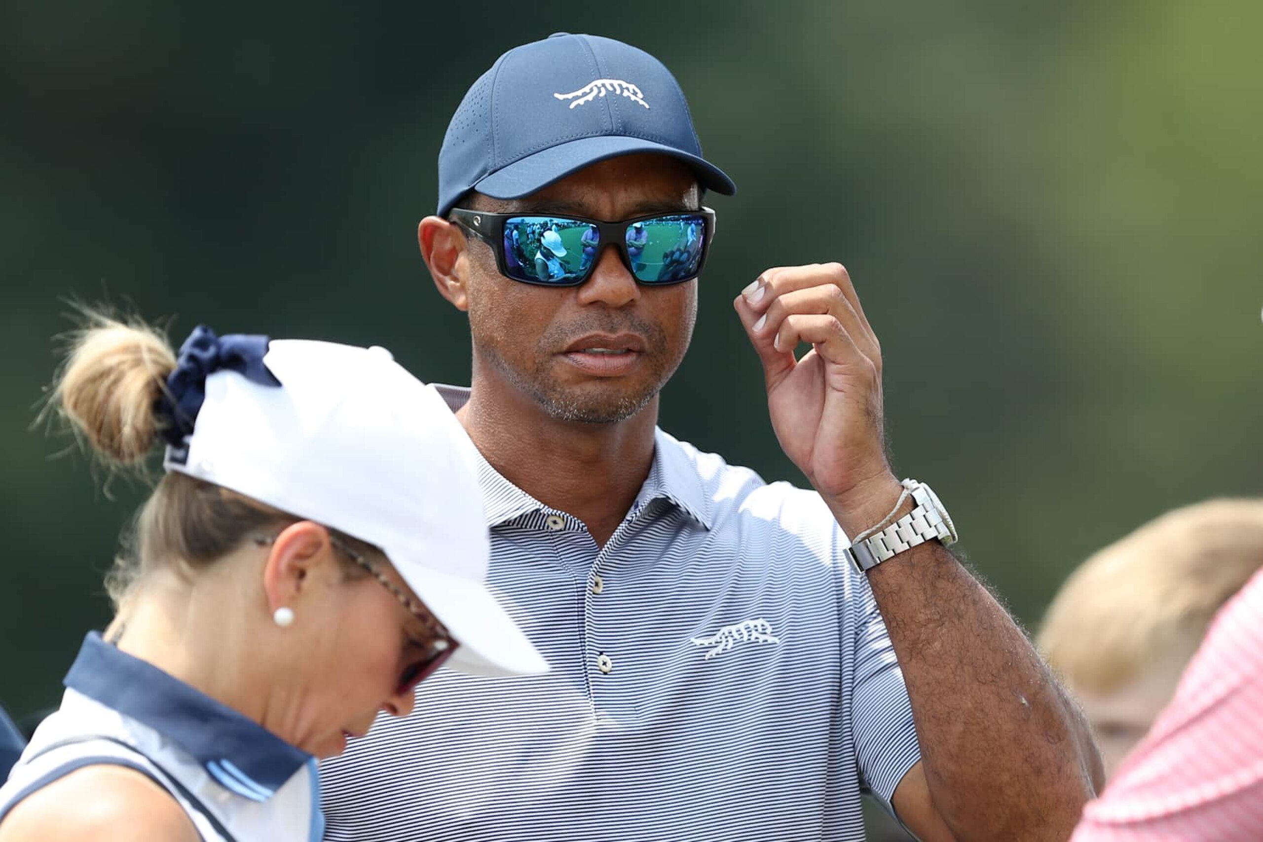 BLOOMFIELD HILLS, MICHIGAN - JULY 23: Tiger Woods of the United States stands near the putting green on day two of the 76th U.S. Junior Amateur Championship on the South Course at Oakland Hills Country Club on July 23, 2024 in Bloomfield Hills, Michigan. (Photo by Raj Mehta/Getty Images)