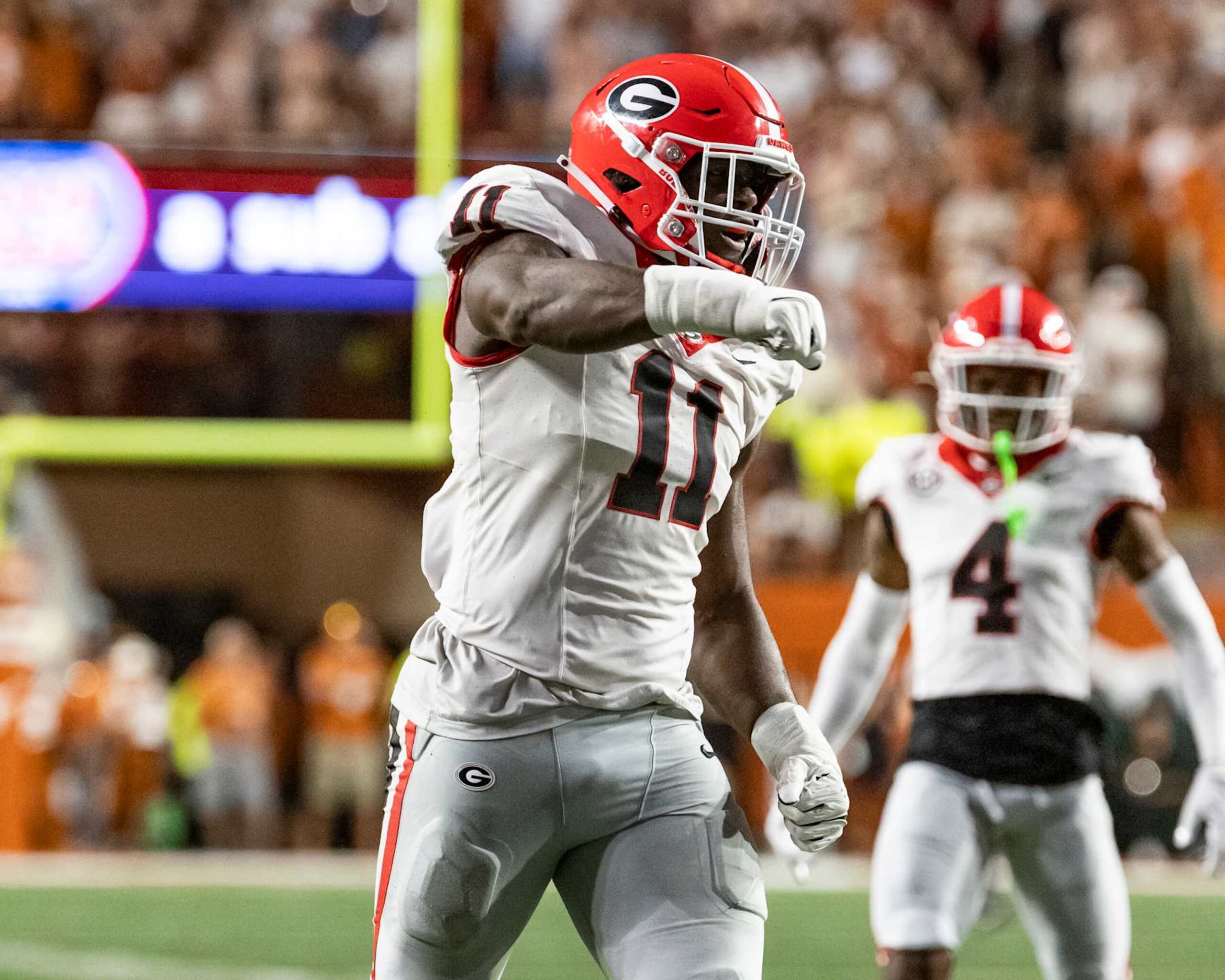 AUSTIN, TEXAS - OCTOBER 19: Jalon Walker #11 of the Georgia Bulldogs celebrates a stop during a game between the between the Georgia Bulldogs and the Texas Longhorns at Darrell K Royal-Texas Memorial Stadium on October 19, 2024 in Austin, Texas. (Photo by Steve Limentani/ISI Photos/Getty Images)