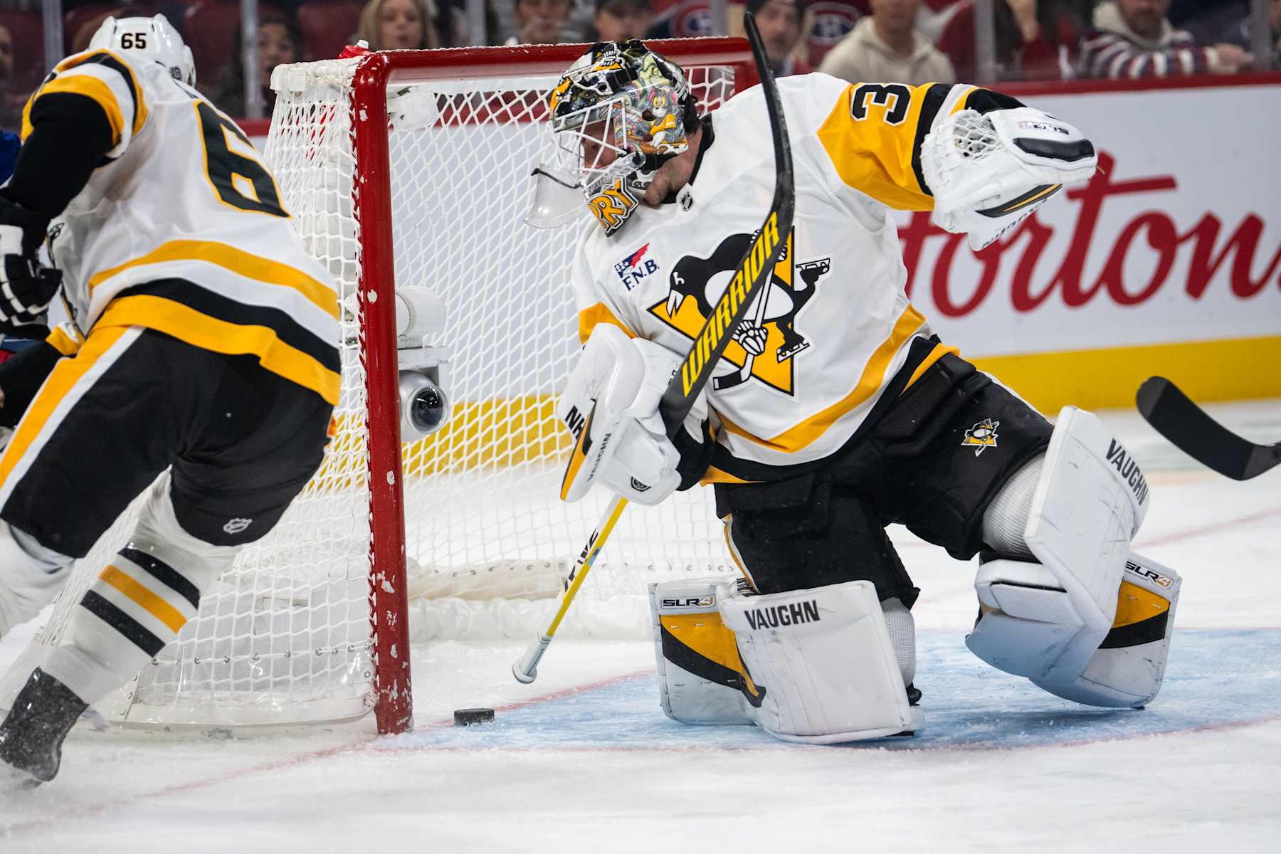 MONTREAL, QC - OCTOBER 14: Tristan Jarry (35) of the Pittsburgh Penguins makes the save  during the second period  of the NHL game between the Pittsburgh Penguins and the Montreal Canadiens on Oct 14, 2024, at the Bell Centre in Montreal, QC(Photo by Vincent Ethier/Icon Sportswire via Getty Images)
