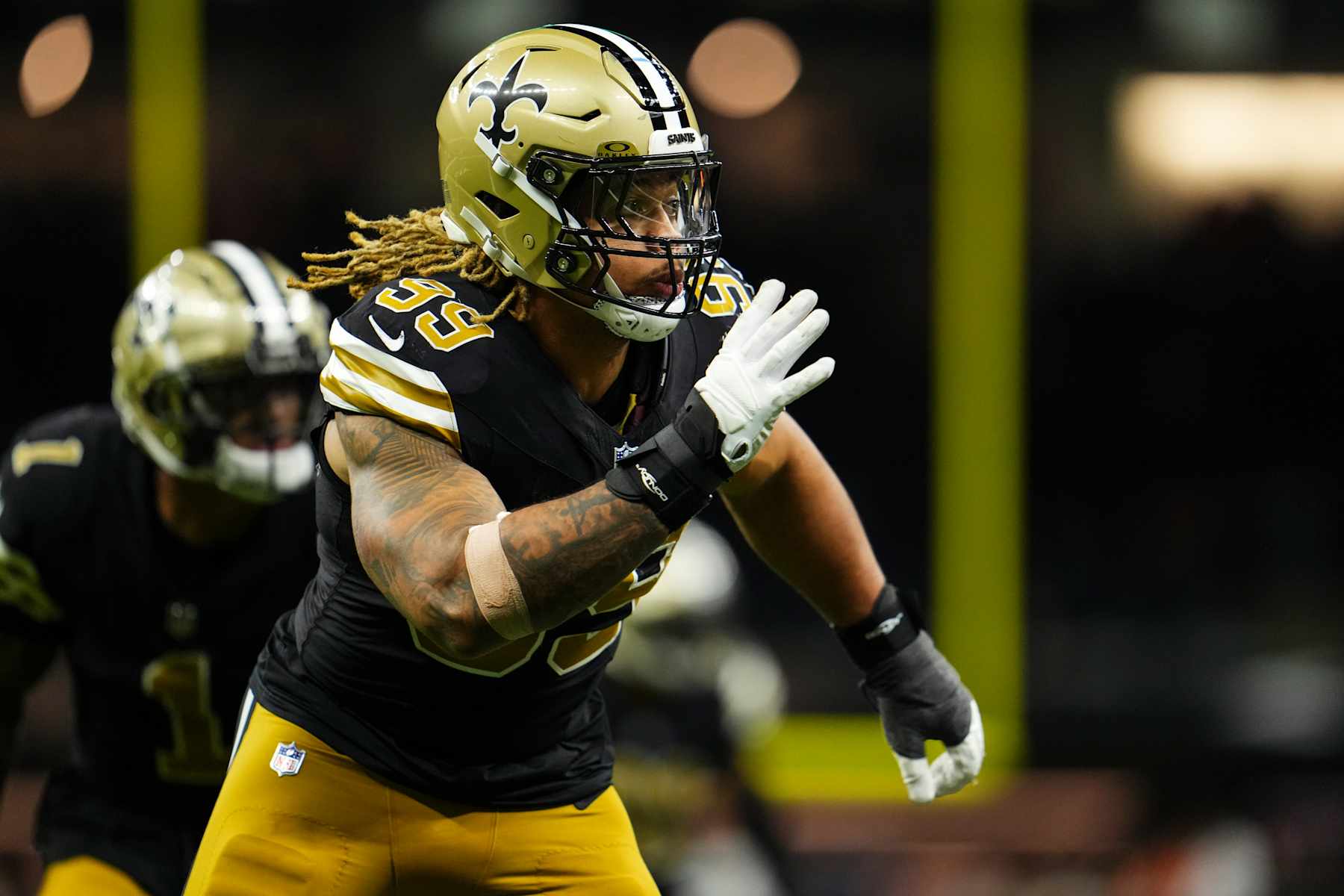 NEW ORLEANS, LA - OCTOBER 17: Chase Young #99 of the New Orleans Saints rushes the passer during an NFL football game against the Denver Broncos at Caesars Superdome on October 17, 2024 in New Orleans, Louisiana. (Photo by Cooper Neill/Getty Images)