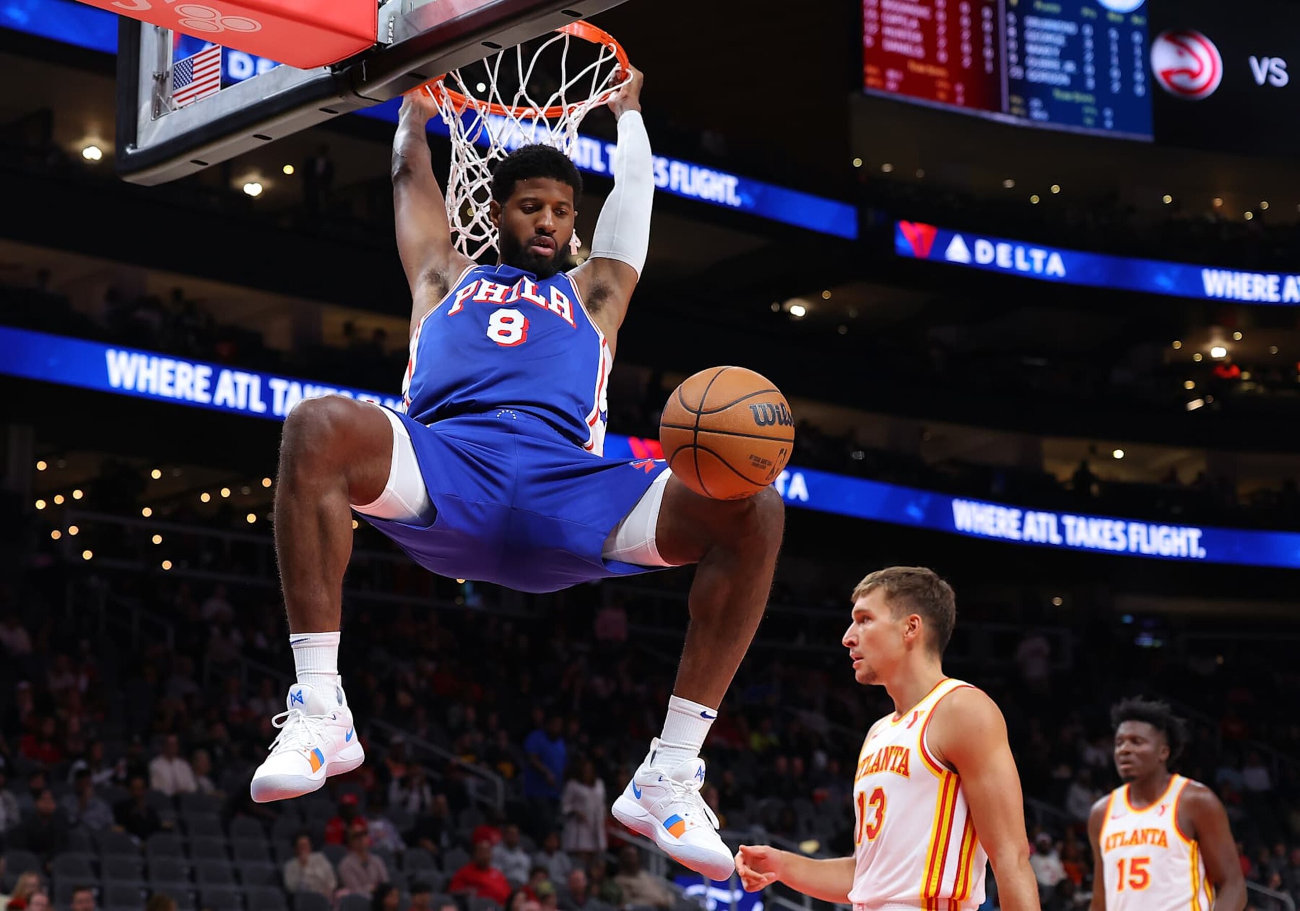 ATLANTA, GEORGIA - OCTOBER 14: Paul George #8 of the Philadelphia 76ers dunks against the Atlanta Hawks during the first quarter at State Farm Arena on October 14, 2024 in Atlanta, Georgia. NOTE TO USER: User expressly acknowledges and agrees that, by downloading and/or using this photograph, user is consenting to the terms and conditions of the Getty Images License Agreement. (Photo by Kevin C. Cox/Getty Images) ATLANTA, GEORGIA - OCTOBER 14: Paul George #8 of the Philadelphia 76ers dunks against the Atlanta Hawks during the first quarter at State Farm Arena on October 14, 2024 in Atlanta, Georgia. NOTE TO USER: User expressly acknowledges and agrees that, by downloading and/or using this photograph, user is consenting to the terms and conditions of the Getty Images License Agreement. (Photo by Kevin C. Cox/Getty Images)