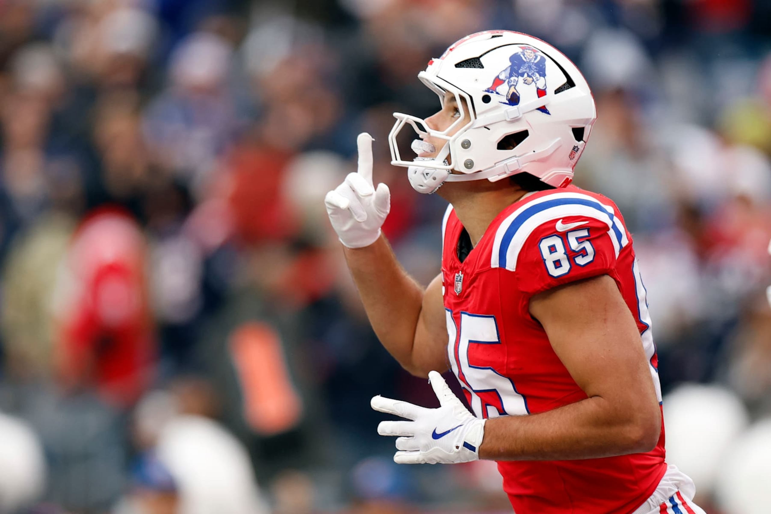 Foxborough, MA - October 13: New England Patriots TE Hunter Henry celebrates a touchdown in the third quarter. (Photo by Danielle Parhizkaran/The Boston Globe via Getty Images)
