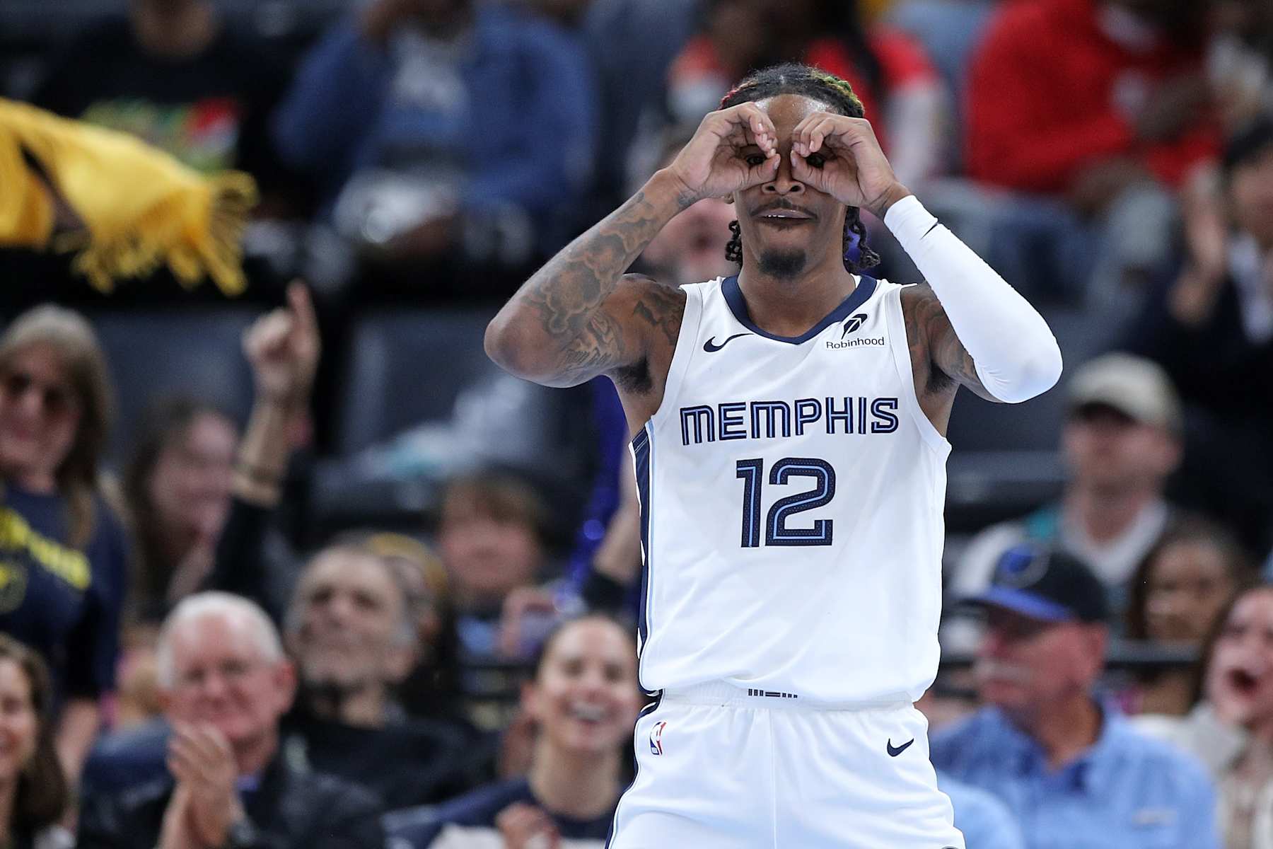 MEMPHIS, TENNESSEE - OCTOBER 18: Ja Morant #12 of the Memphis Grizzlies celebrates during the first half against the Miami Heat at FedExForum on October 18, 2024 in Memphis, Tennessee. NOTE TO USER: User expressly acknowledges and agrees that, by downloading and or using this photograph, User is consenting to the terms and conditions of the Getty Images License Agreement. (Photo by Justin Ford/Getty Images)