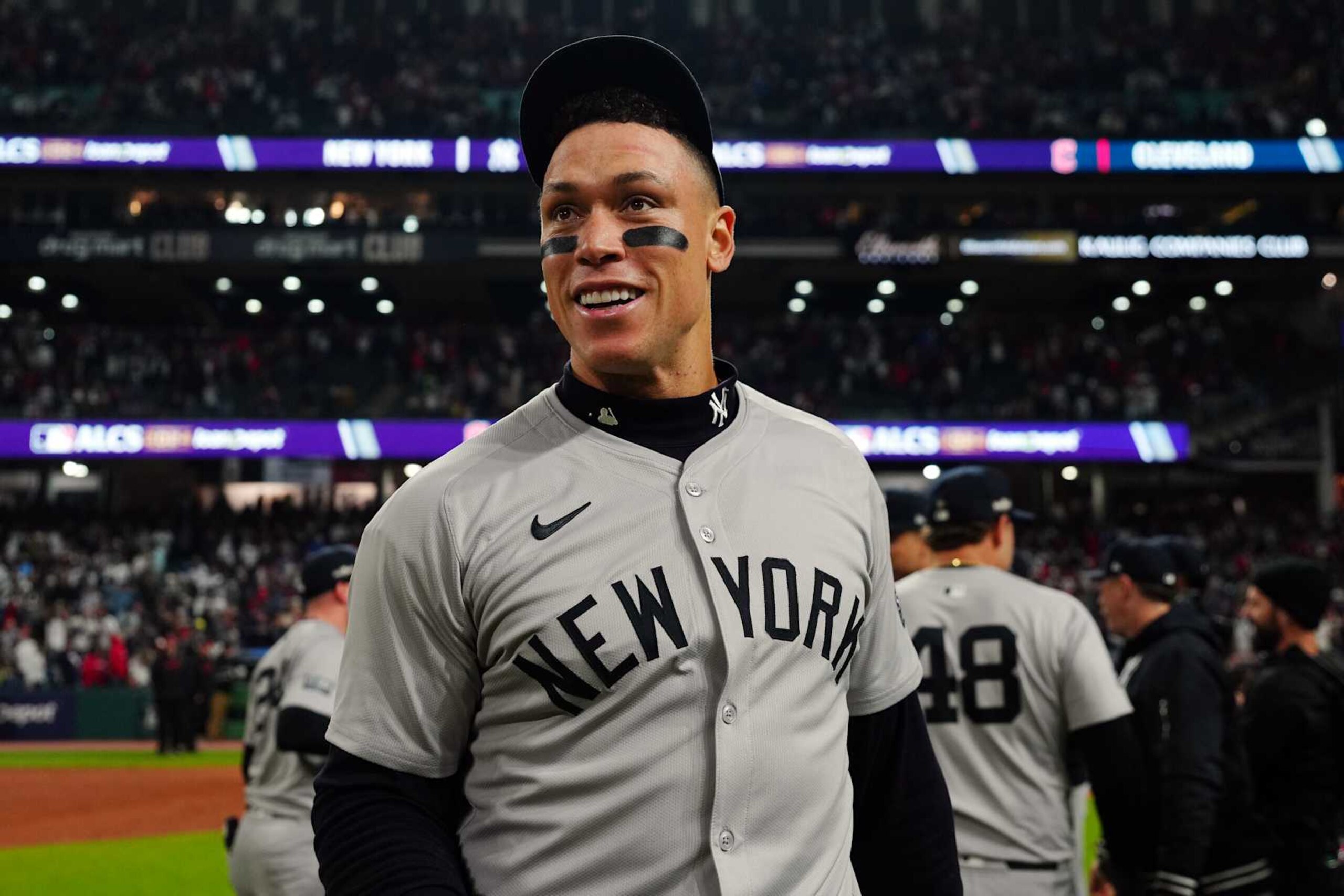 CLEVELAND, OH - OCTOBER 19:  Aaron Judge #99 of the New York Yankees celebrates on the field after defeating the Cleveland Guardians in Game 5 of the ALCS presented by loanDepot to advance to the 2024 Major League Baseball World Series at Progressive Field on Saturday, October 19, 2024 in Cleveland, Ohio. (Photo by Mary DeCicco/MLB Photos via Getty Images)