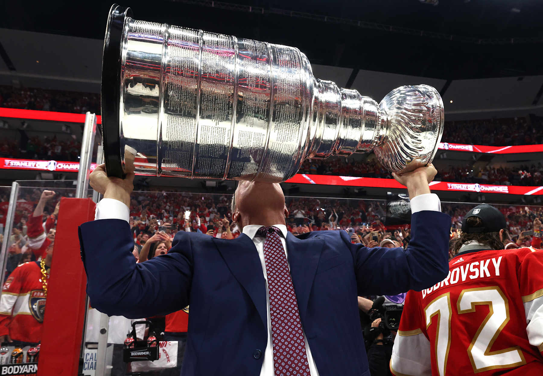 SUNRISE, FLORIDA - JUNE 24: Head coach Paul Maurice of the Florida Panthers kisses the Stanley Cup after Game Seven of the 2024 Stanley Cup Final between the Edmonton Oilers and the Florida Panthers at Amerant Bank Arena on June 24, 2024 in Sunrise, Florida. (Photo by Dave Sandford/NHLI via Getty Images)